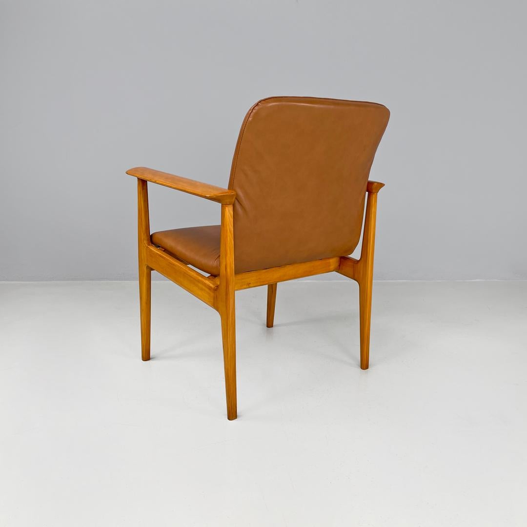 Mid-20th Century Italian mid-century modern wooden brown leather armchair Anonima Castelli 1960s