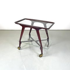 Italian mid-century modern wooden cart two glass tops and brass wheels, 1950s