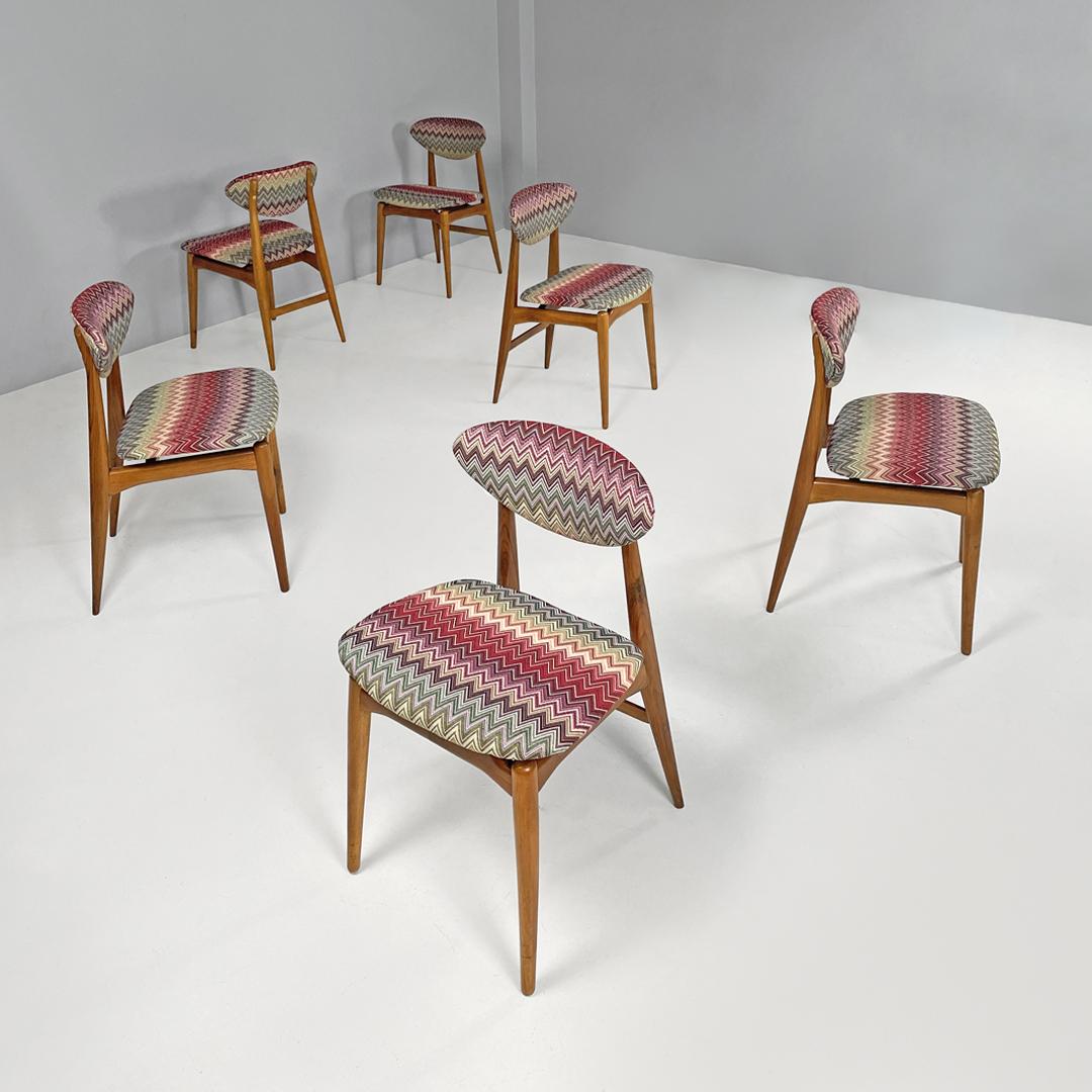 Italian mid-century modern wooden chairs with Missoni fabric, 1960s
Set of six wooden chairs with and Missoni fabric. The backrest is curved and has an elongated and rounded shape at the sides. The structure of the legs is slightly distanced from
