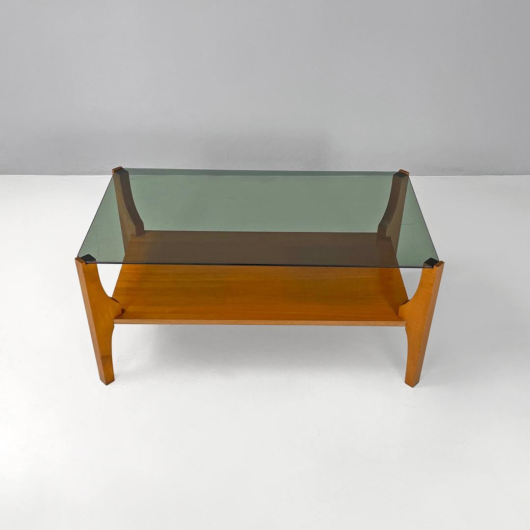 Italian mid-century modern wooden coffee table with smoked grey glass top, 1960s In Good Condition For Sale In MIlano, IT