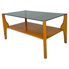 Table basse italienne en bois moderne du milieu du siècle avec plateau en verre gris fumé, années 1960