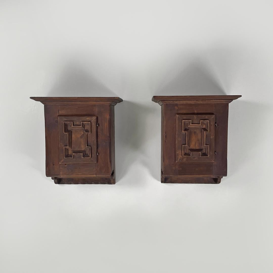 Italian mid-century modern wooden wall nightstands with decorated doors, 1960s In Good Condition For Sale In MIlano, IT
