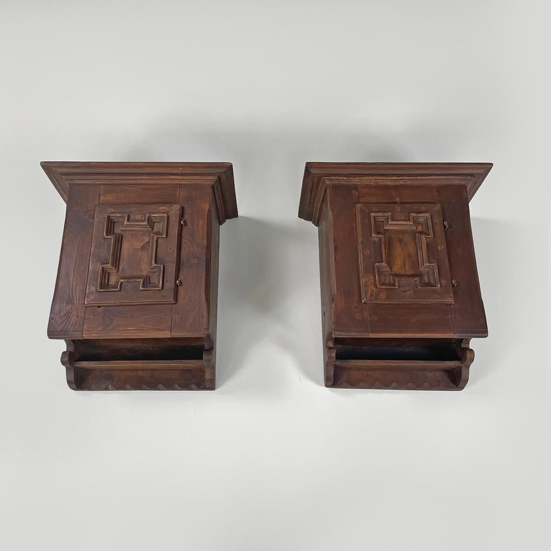 Italian mid-century modern wooden wall nightstands with decorated doors, 1960s For Sale 1