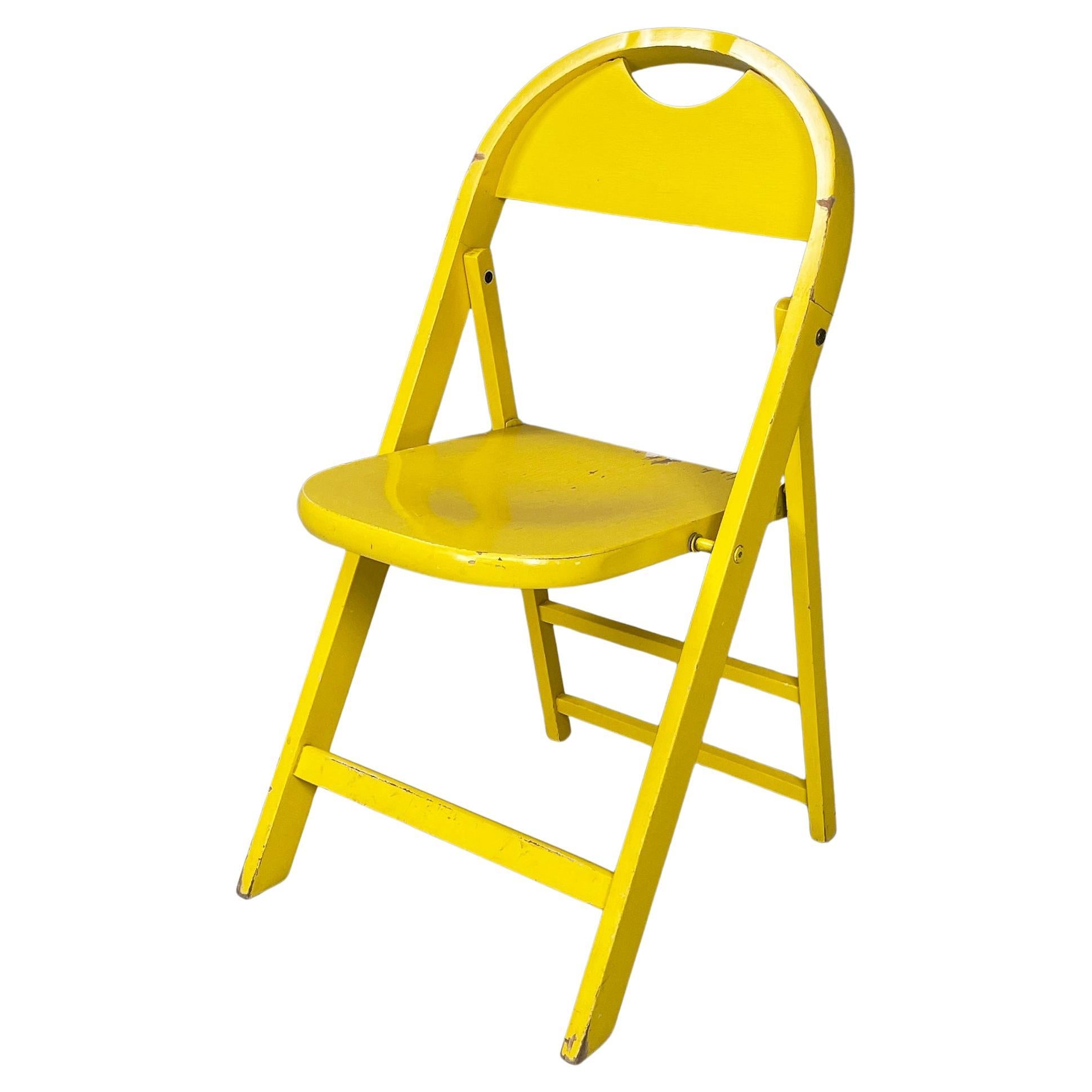 Sedia pieghevole italiana di metà secolo in legno giallo Tric di Castiglioni, anni '60