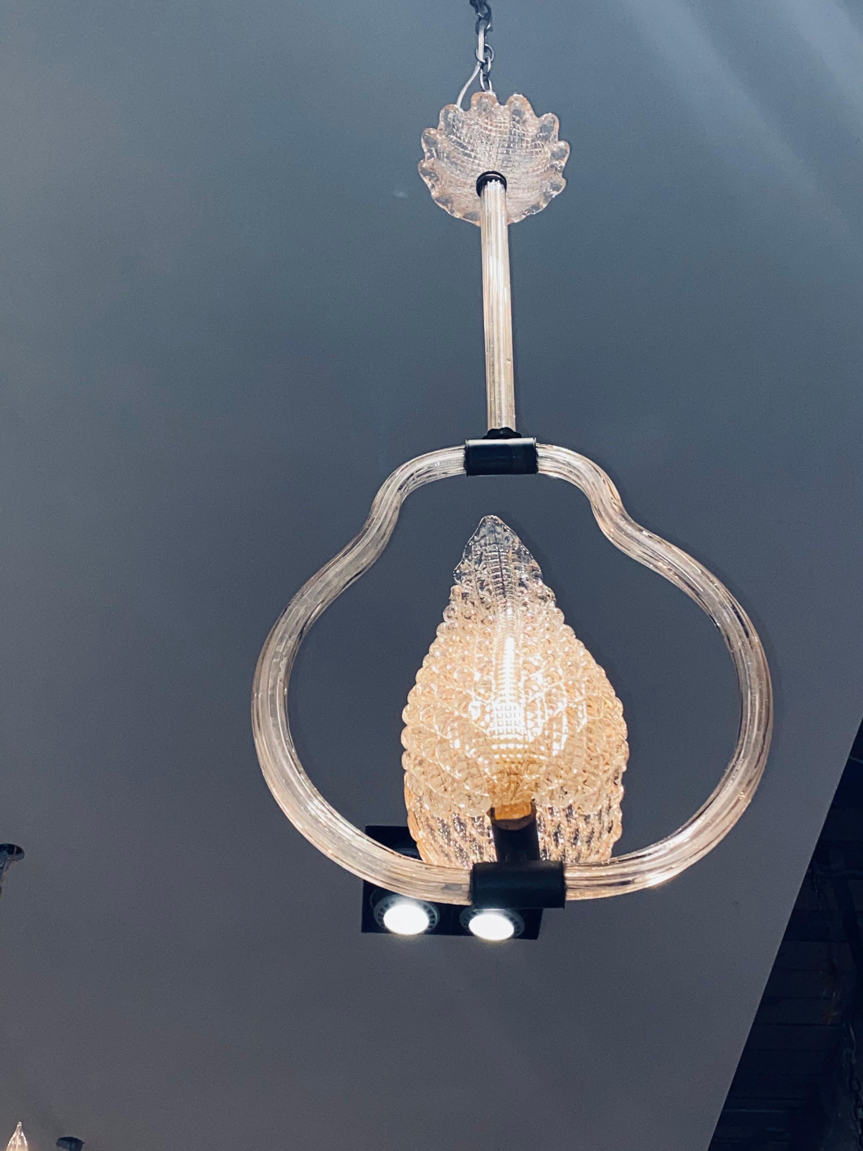 Italian Murano art glass chandelier, in the style of Barovier & Toso, c.1940s-1950s, blush pink glass, scalloped ceiling cap with impressed lattice pattern, fluted glass-clad standard and lobed ring, two foliate-form shades, concealing a single