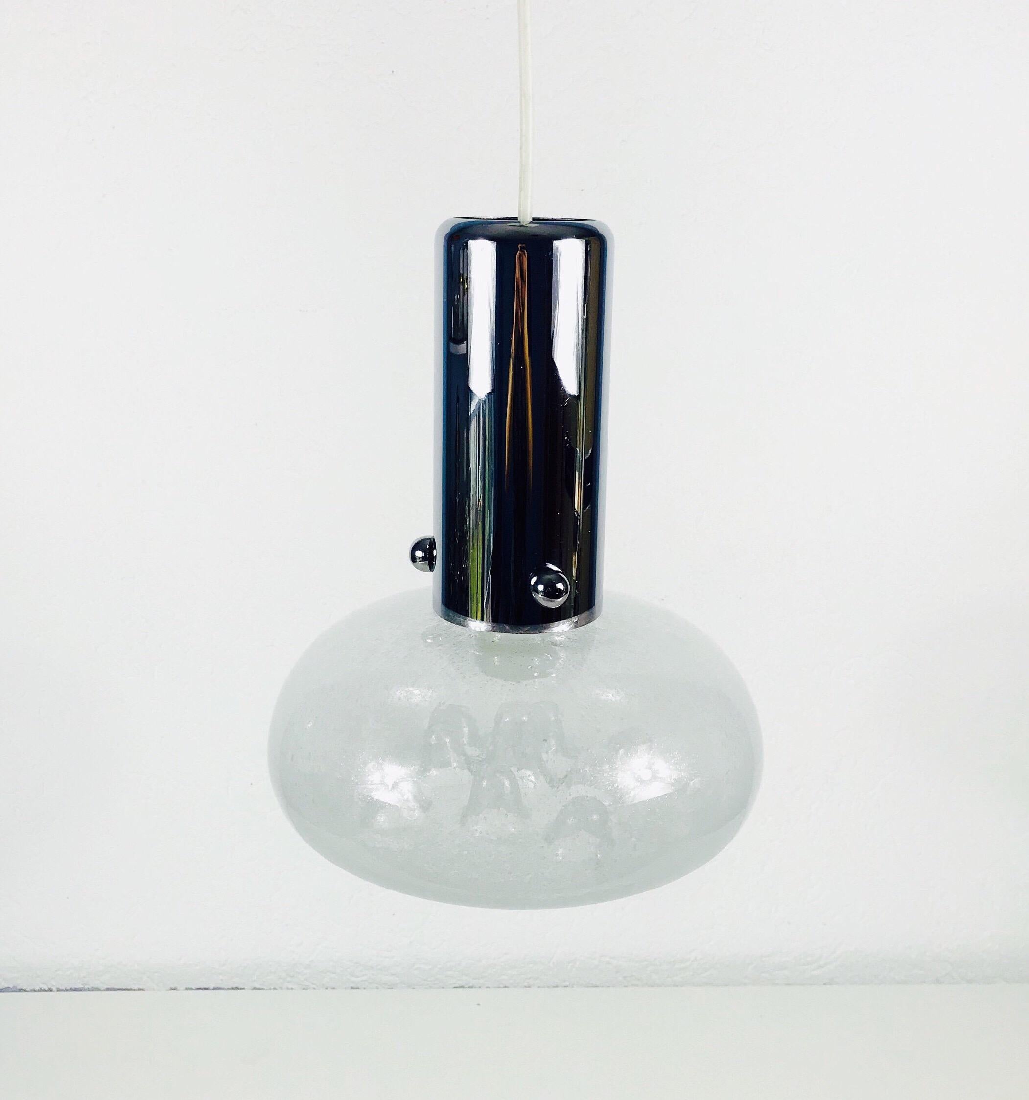 An pendant lamp made in Italy in the 1960s. It is fascinating with its Murano glass and the beautiful shape in it.

Measurements:

Height 58 cm

Diameter 28 cm

The light requires one E27 light bulb.