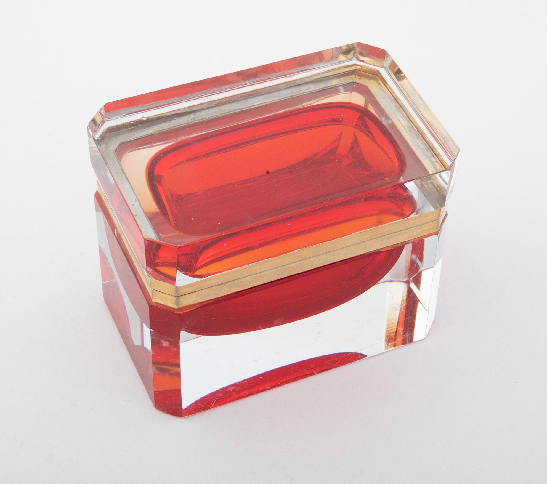Italian midcentury Murano Sommerso cherry red interior to clear glass box with brass mounts.