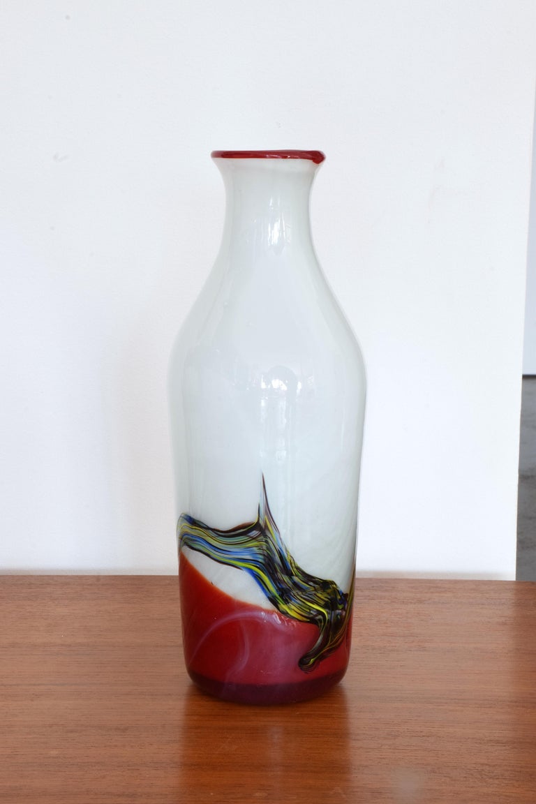 A 20th century vintage Italian bottled shaped vase in white with a red rim, bottom, and abstract pattern.
Italy, circa 1970s-1980s. A beautiful decorative object.

About us: 
Spirit Gallery presents a harmonious mix of iconic and engaging 20th