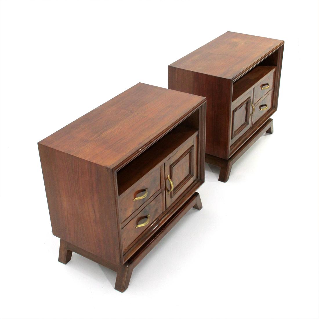 Pair of Italian-made bedside tables produced in the 1950s.
Structure in veneered wood.
Pair of drawers and storage compartment with brass handles
Legs in solid wood.
Good general conditions, some signs due to normal use over time.

Dimensions: