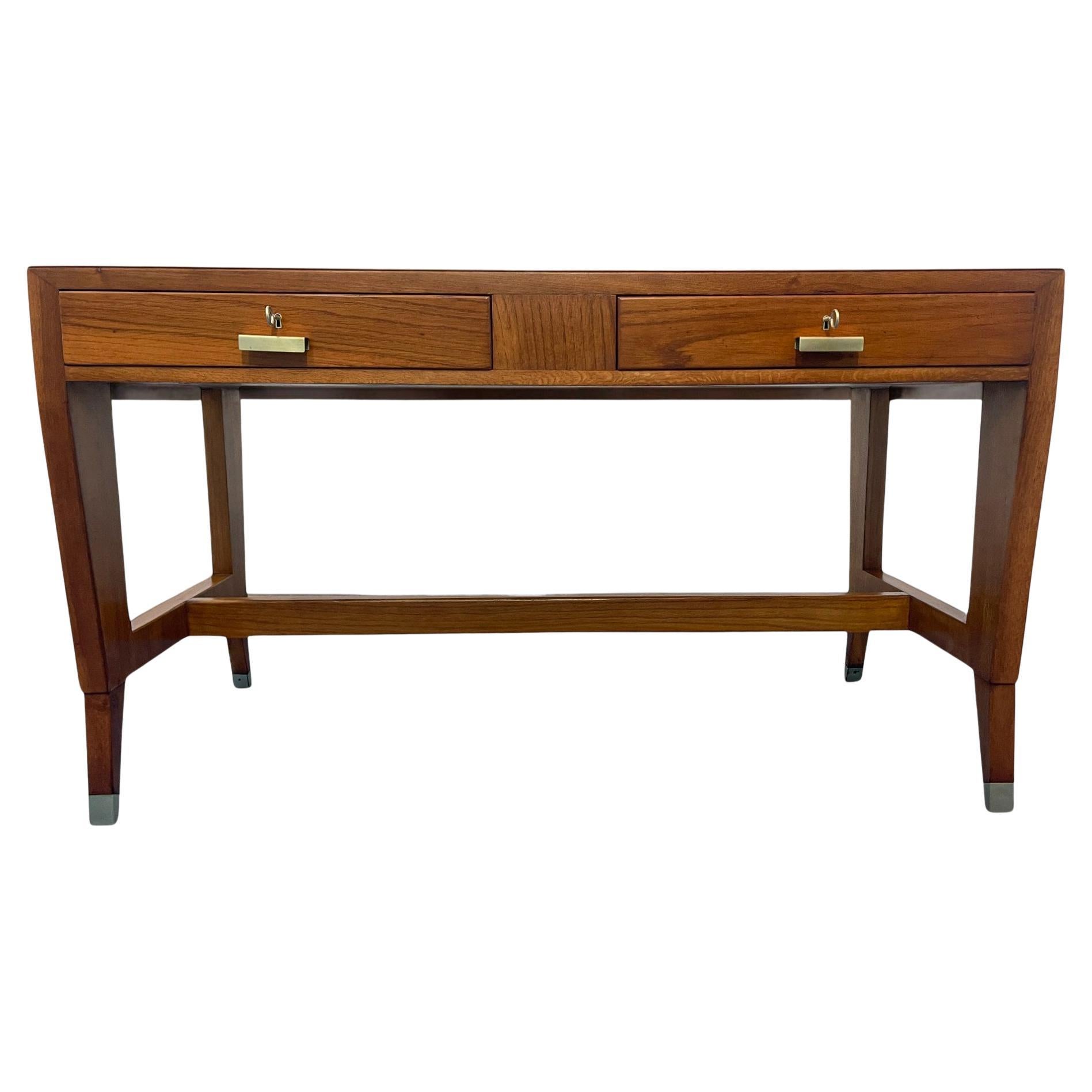 Gio' Ponti's iconic desk

In 1950, Gio' Ponti designed a range of desks for the Banca Nazionale del Lavoro, and one particular model stands out as the most precious of them all. This iconic desk boasts a wooden top instead of linoleum, two drawers
