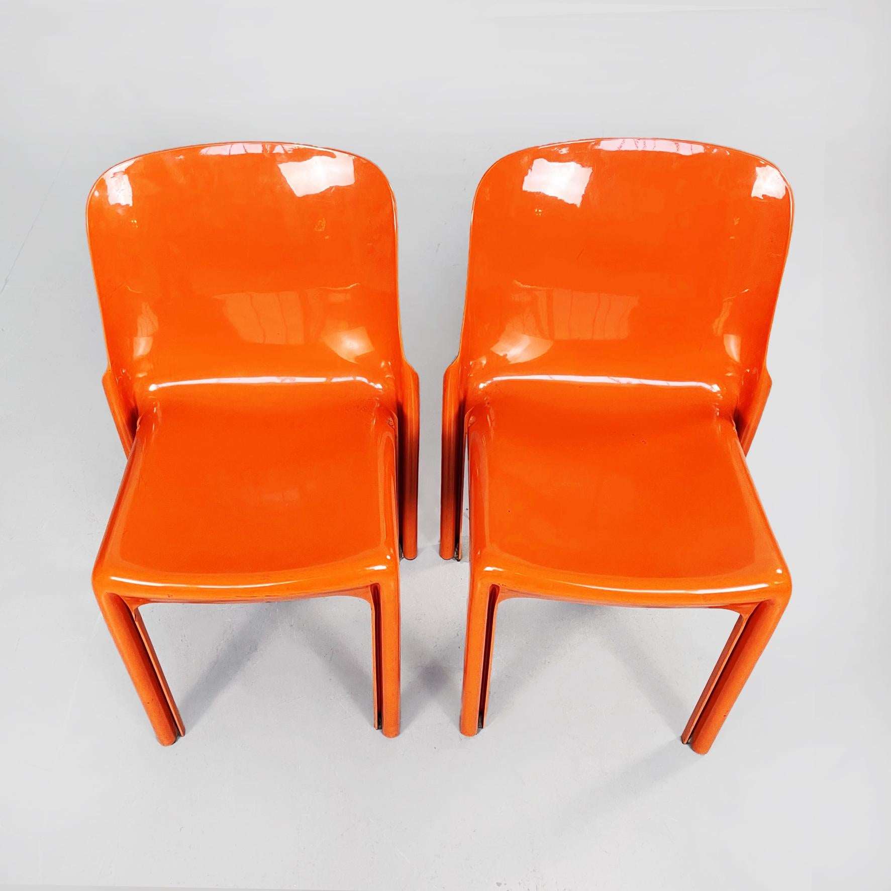 Italian mid-century Orange plastic Selene chairs by Magistretti for Artemide, 1960s
Pair of Selene chairs in bright dark orange plastic. The rectangular seat and back have rounded corners. The plastic monocoque structure has grooves along the legs