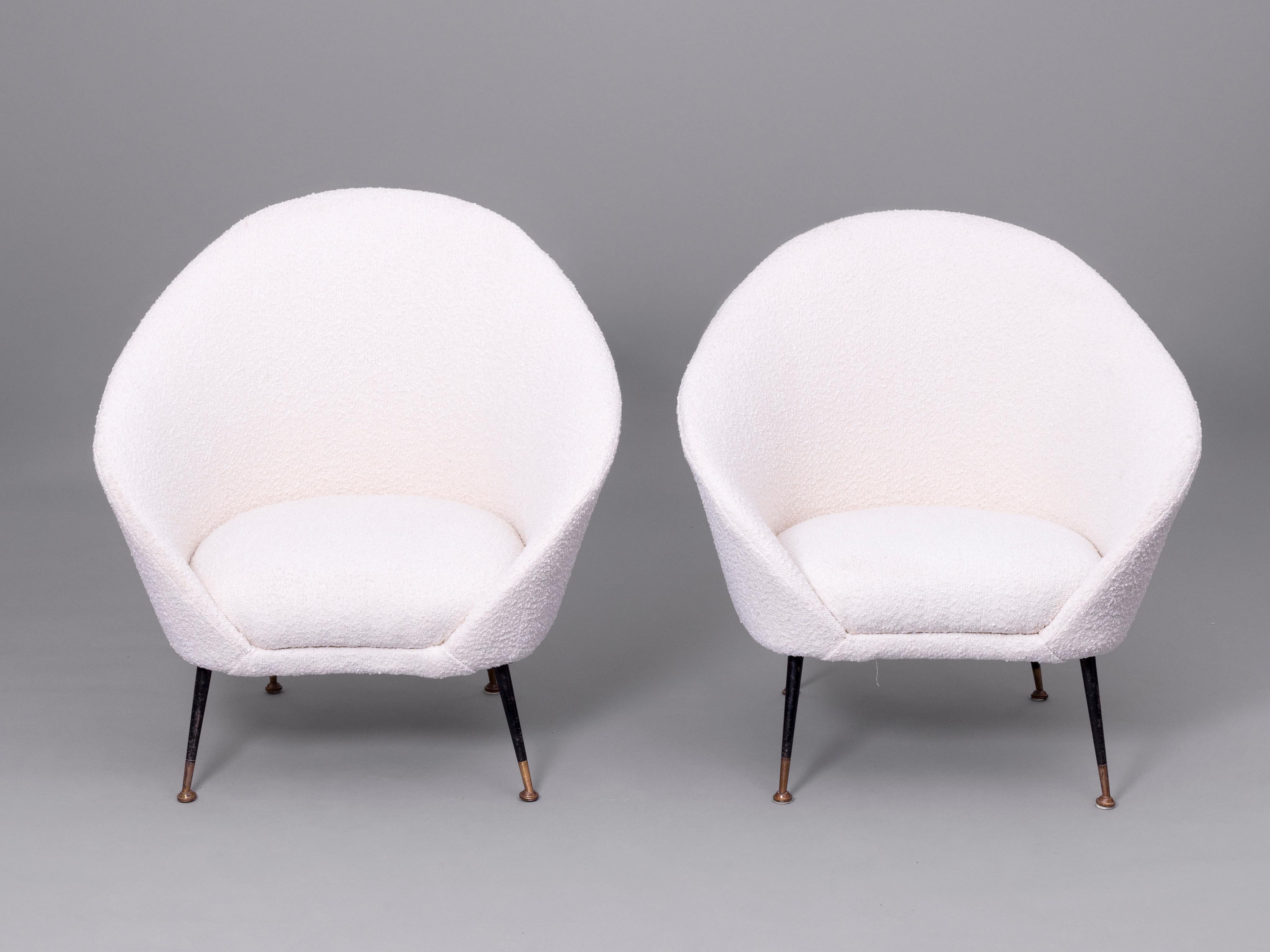 This pair of Federico Munari design Armchairs have been reupholstered in white bouclé. Italy, 1950s

This pair of seats possess the key features of the designer’s unmistakable style, curvy and embracing lines that nest the seat creating a beautiful