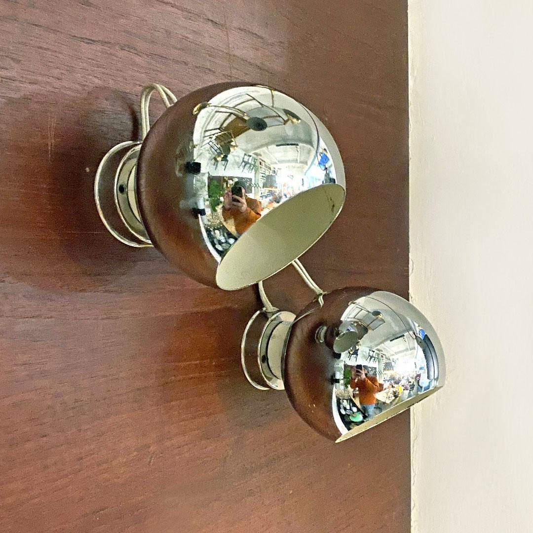 Italian Mid-Century Modern pair of chromed metal applique by Goffredo Reggiani for Reggiani Illuminazione, with own patent, 1970s
Sphere applique in chromed metal with magnet coupling that allows the orientation of the sphere.
Designed by Goffredo