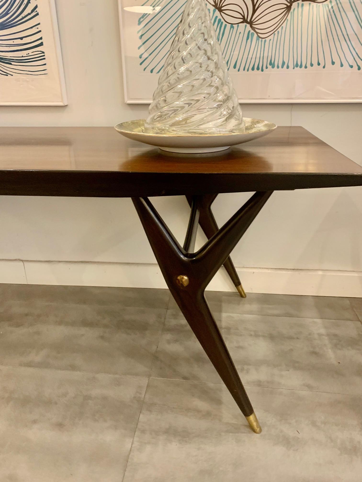 Italian coffee table, design by Ico Parisi in rosewood, ebonized wood and bronze on screws and sabot.