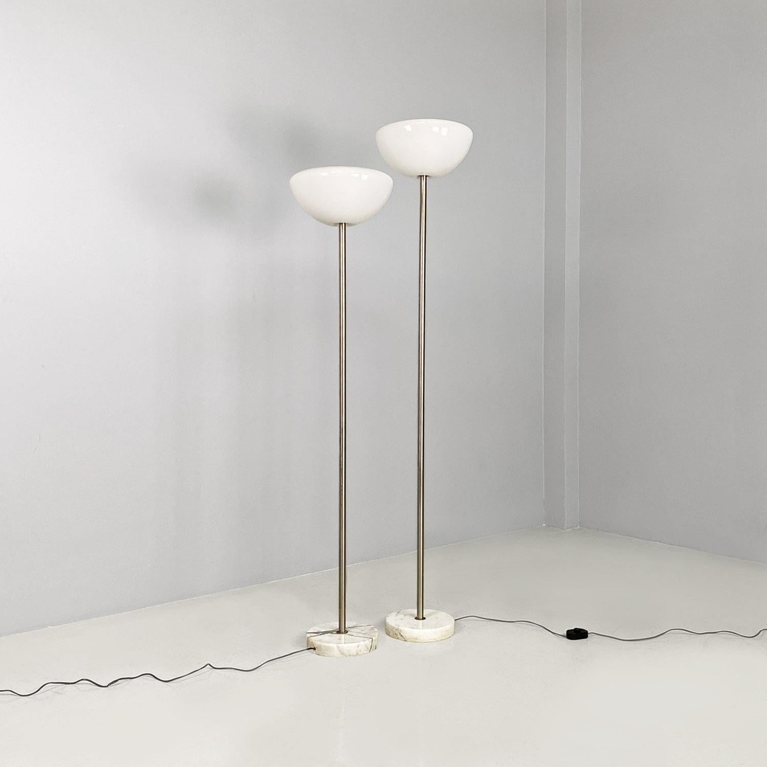 Italian mid century modern Papavero white opaline glass, metal and marble floor lamps by Achille Castiglioni for Flos, 1964.
Papapvero model floor lamps, with a round marble base, steel stem and white opaline glass diffuser, flower-shaped, empty in