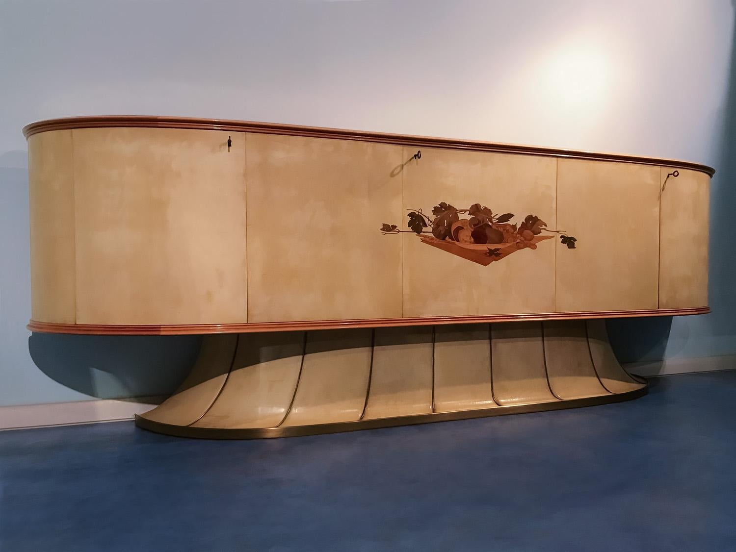 Stunning and very rare Sideboard designed by Vittorio Dassi between the 1940s and 1950s, characterized by a demilune shape case having top and doors covered in parchment, with the central panels finished with a superb inlay decoration of a