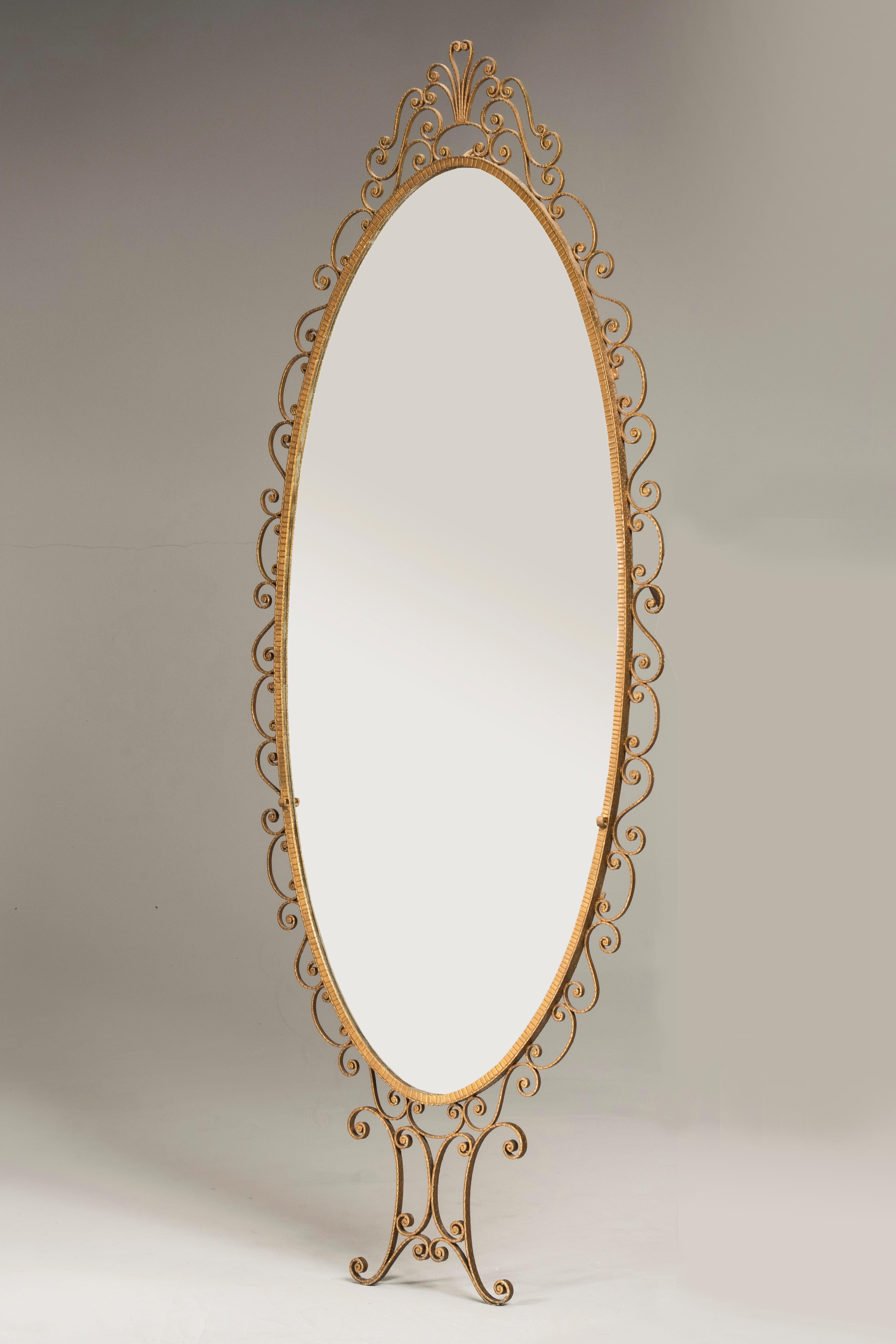 Italian midcentury pier Luigi Colli golden wrought iron oval mirror

Oval mirror with golden wrought iron frame, by Italian designer Pier Luigi Colli, Italy, 1950s. This designer was famous for his particular capability of working the iron. You