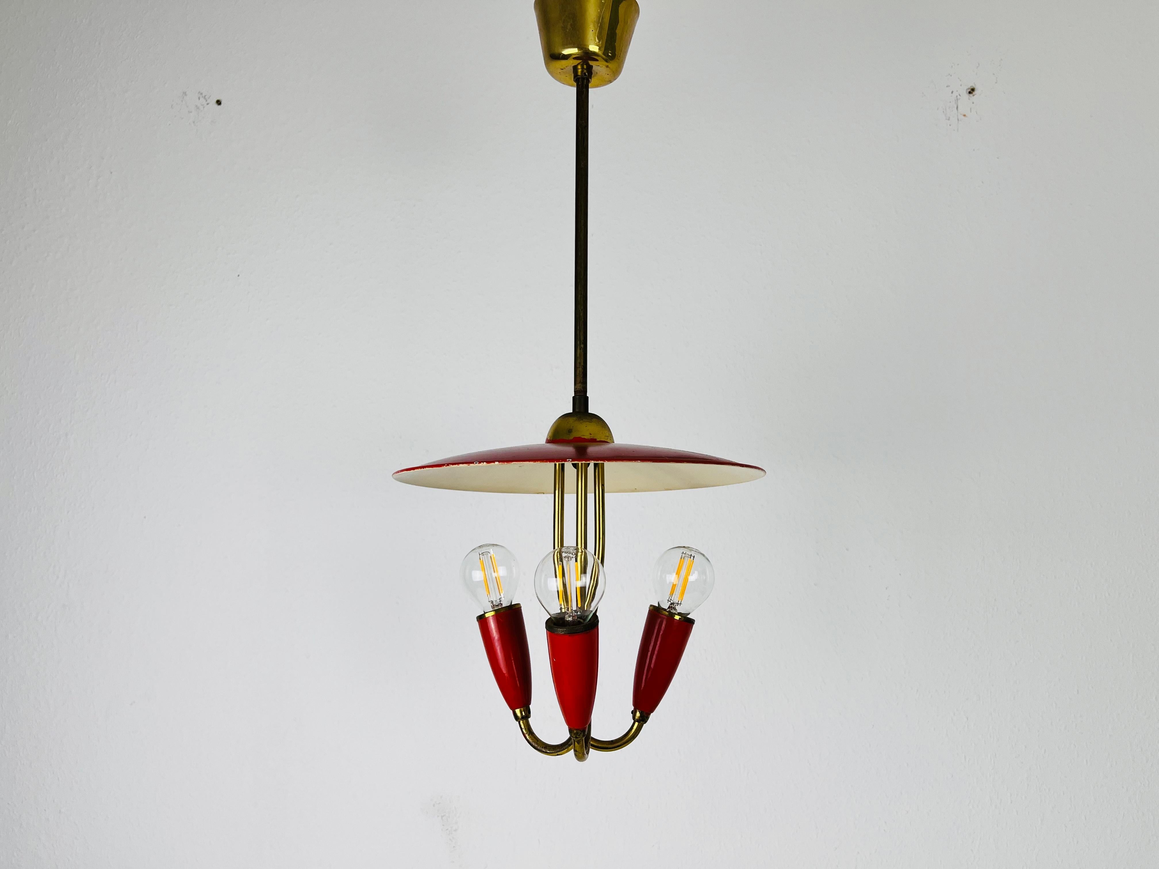 Mid-Century Modern Italian Mid-Century Red and Brass 3-Arm Sputnik Chandelier, 1960s