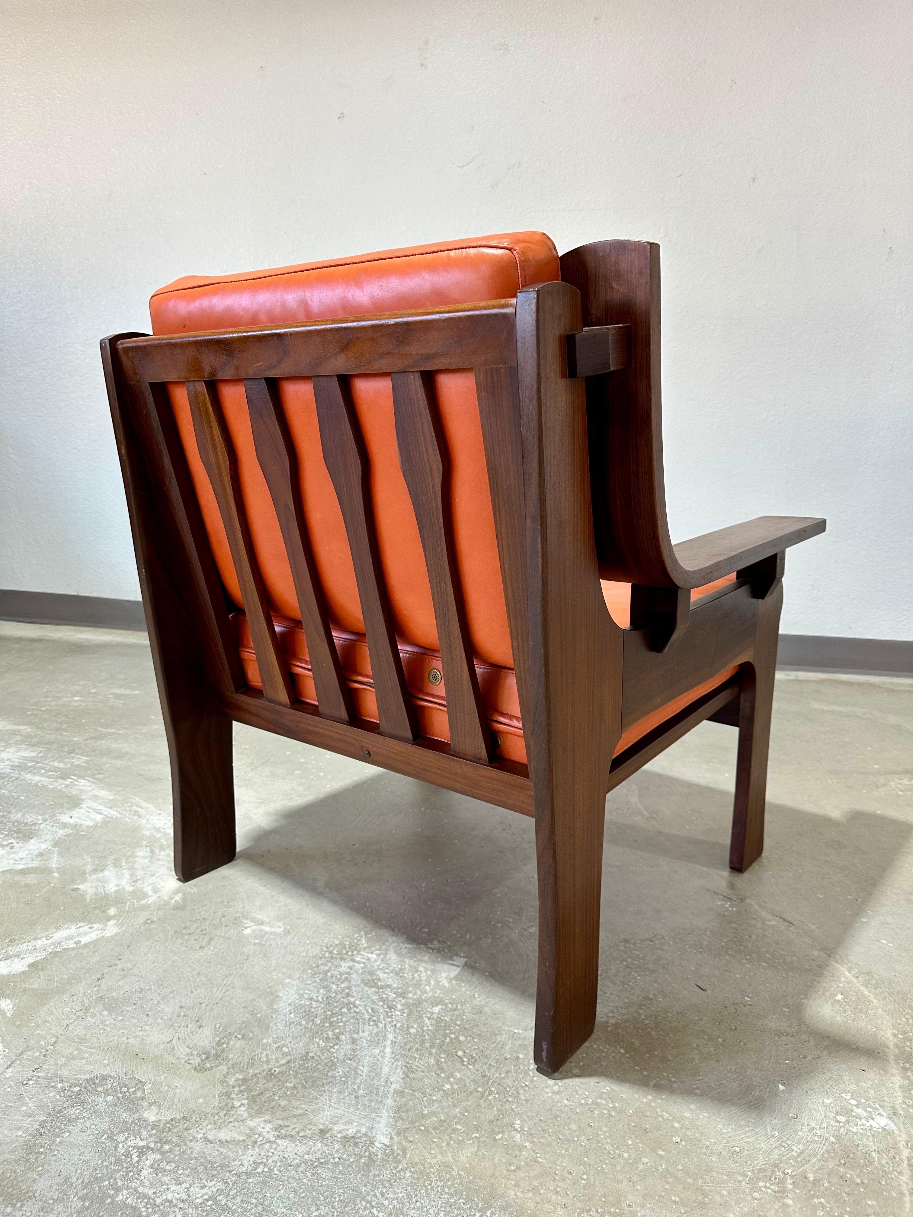 Mid-Century Modern Italian Mid Century Rosewood and Leather Lounge Chair For Sale