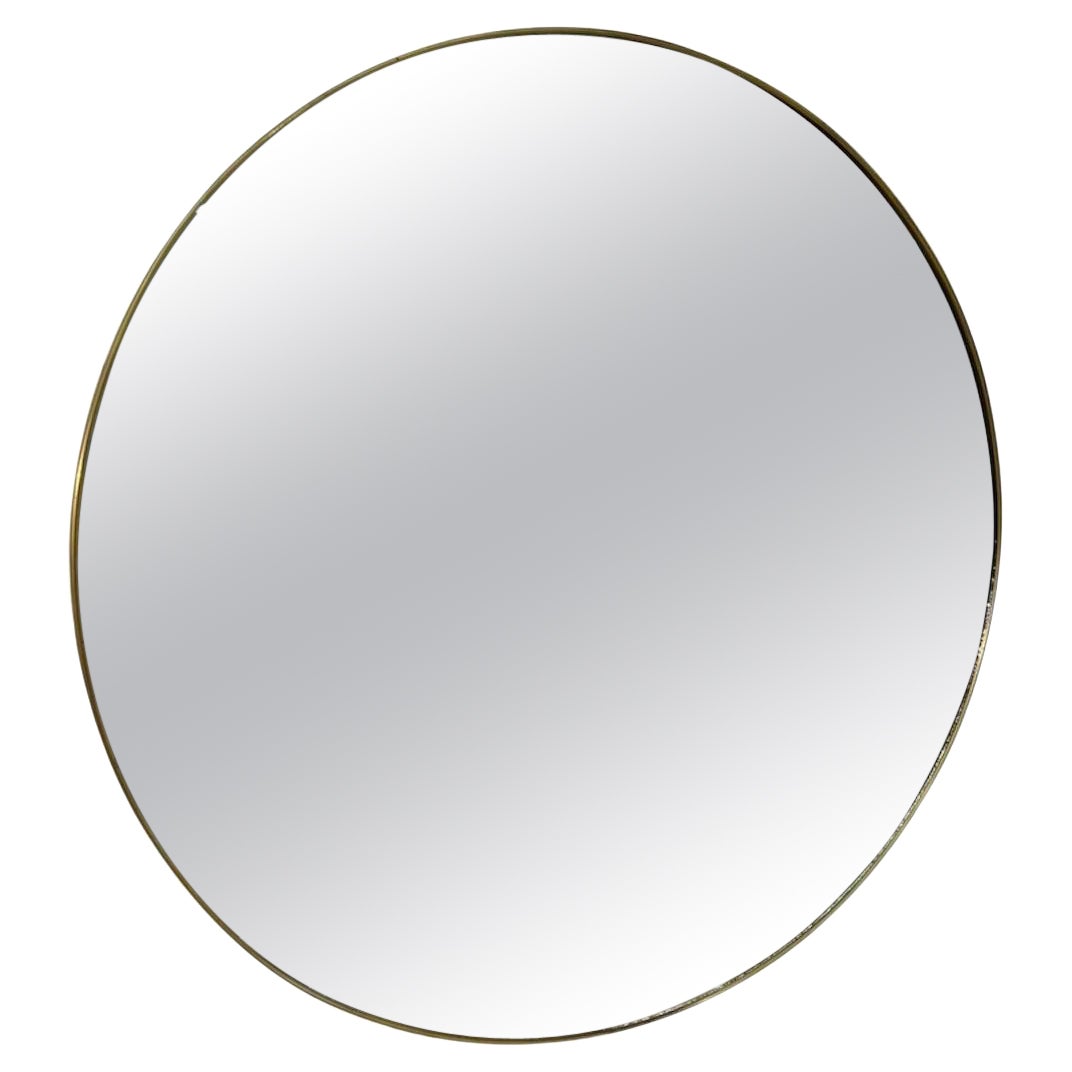 Miroir mural rond encadré de laiton, Italie, milieu du siècle, années 1950 en vente