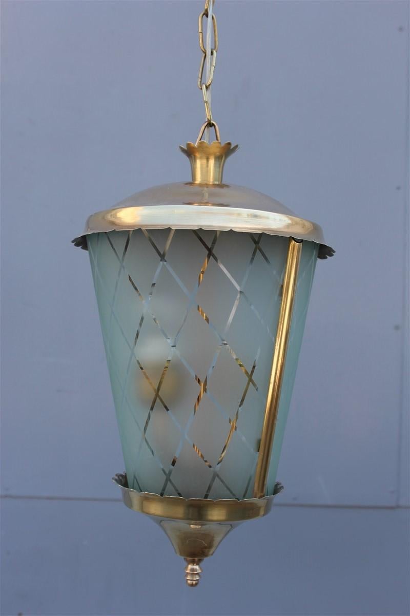 Italian midcentury round lantern in satin glass and brass 1950s.
2 light bulbs E27 max 100 watt each.
Only lantern height cm.38 diameter cm.22.