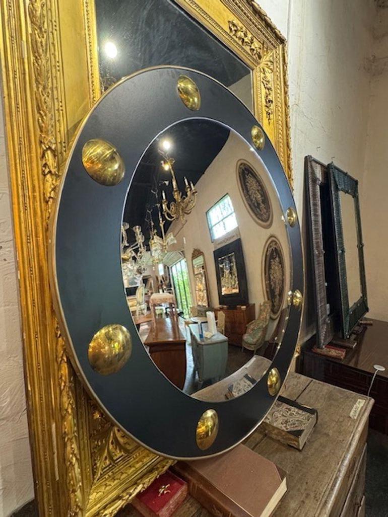 Italian mid-century painted steel and brass round mirror. You're exploring a sleek and sculptural category—Italian mid-century painted steel and brass round mirrors offer a refined blend of industrial edge and glamorous warmth. These pieces are