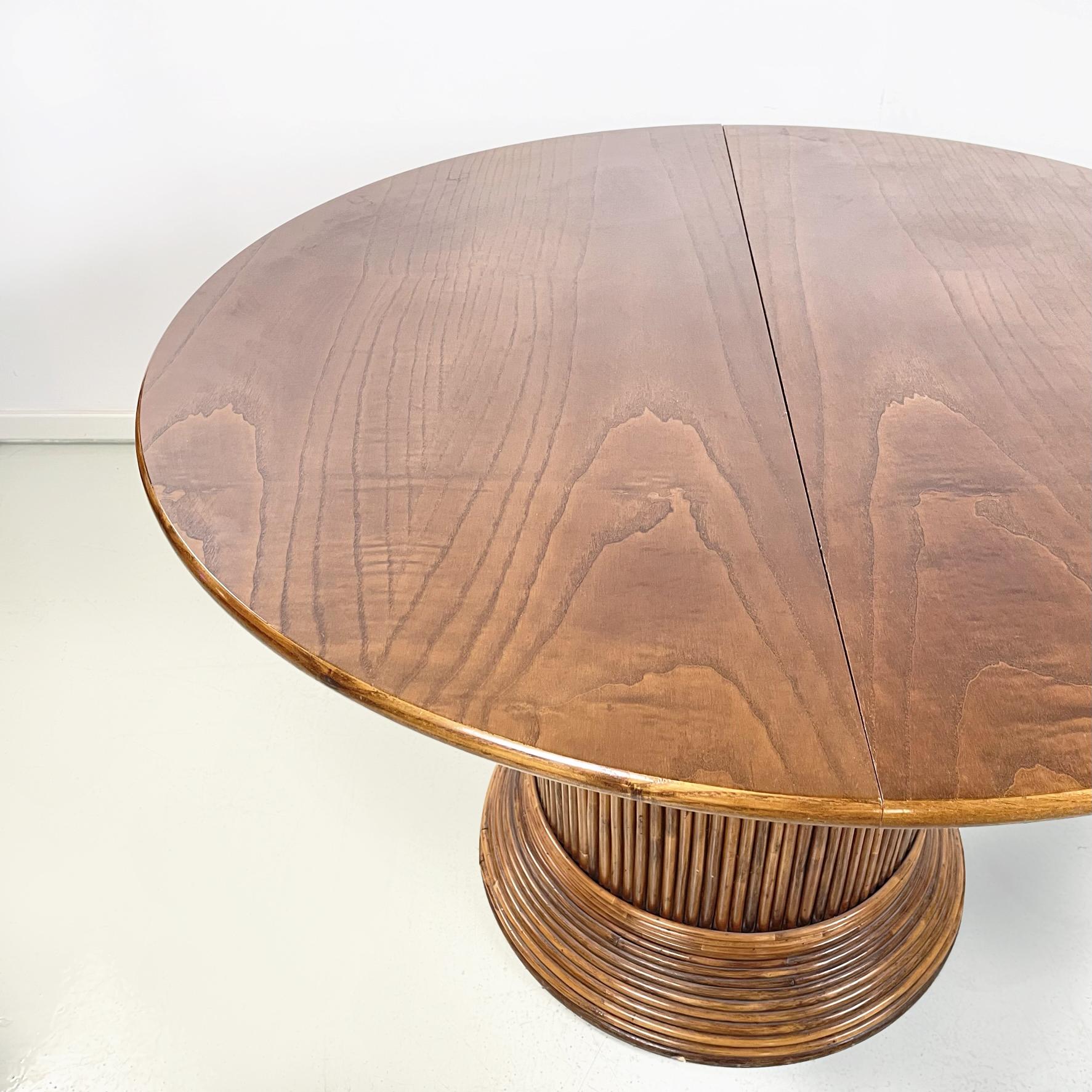 Bamboo Italian mid-century Round or oval wooden dining table with extensions, 1960s For Sale