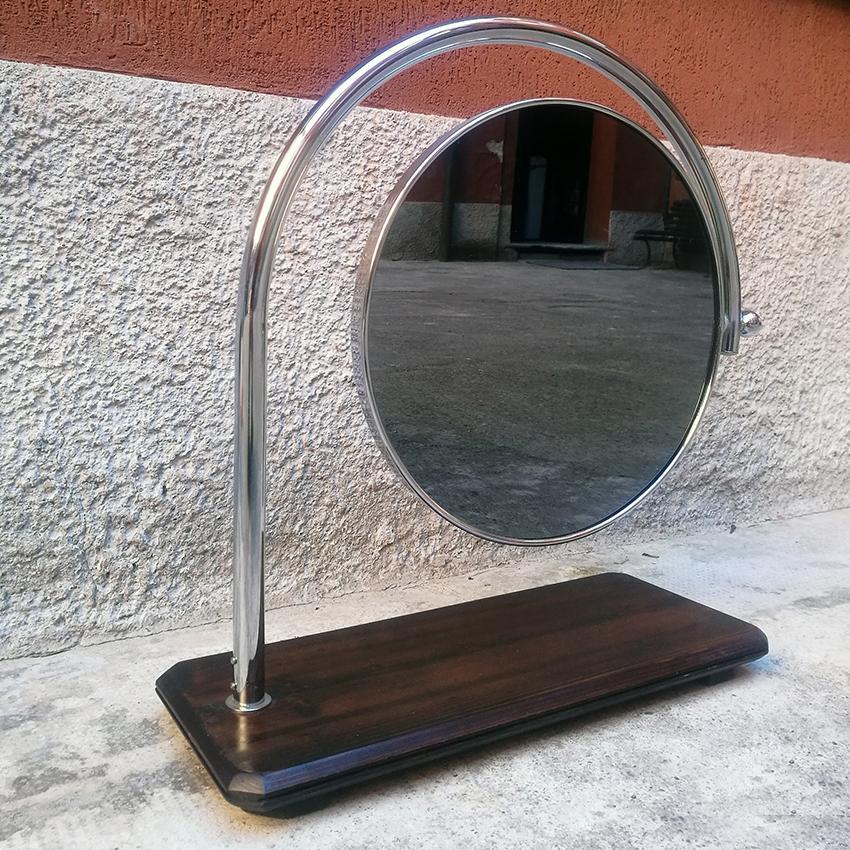Italian midcentury round table mirror with wooden base, 1970s
Round table mirror, in metal with wooden base, adjustable both in the mirror and in the arched structure
Good condition
Measures: 55 x 23 x 63 H cm.