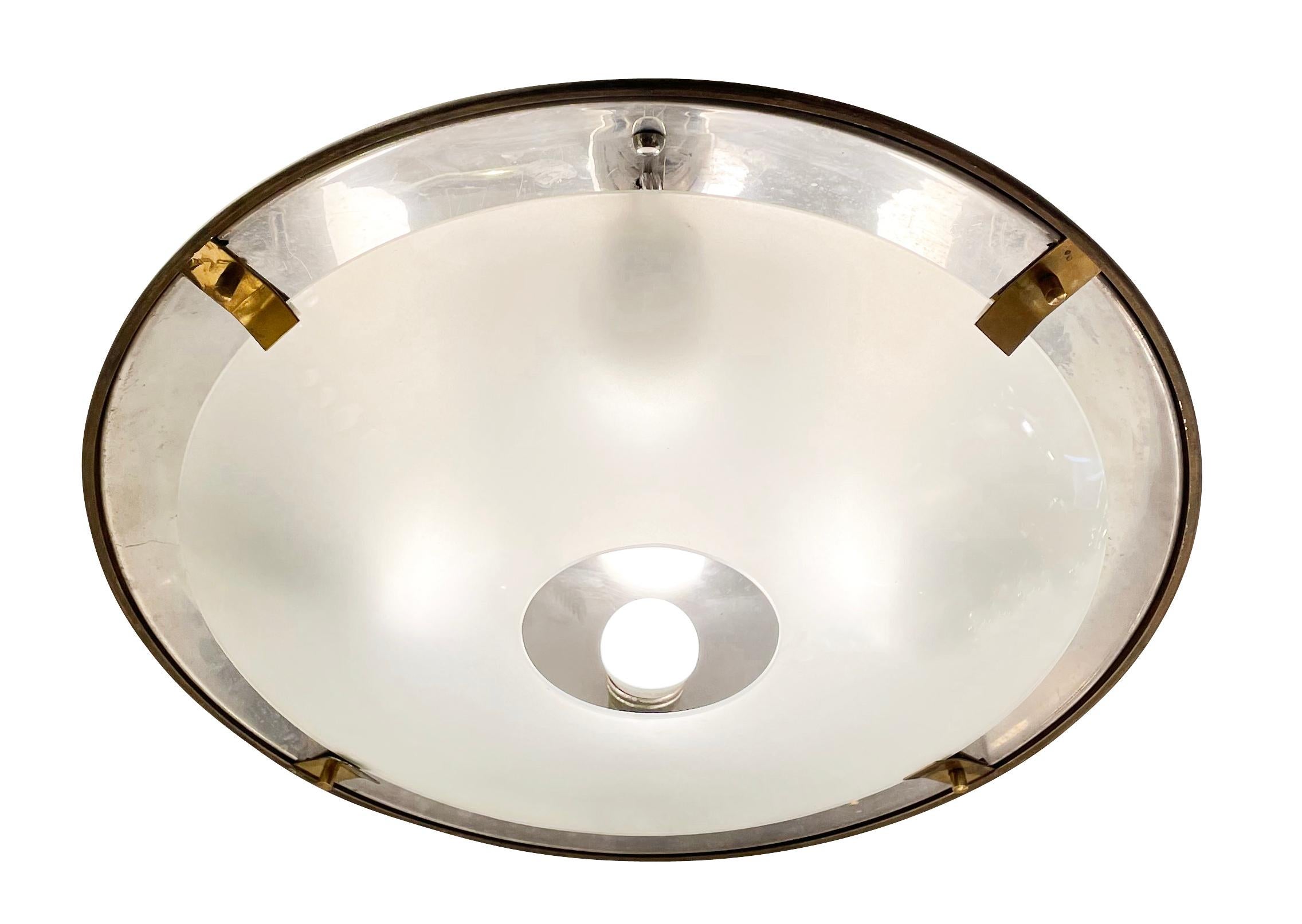 Italian midcentury semi-flush ceiling light with a perforated frosted glass shade and white and black exterior. Glass clips are brass and holds four E26 bulbs.

Condition: Excellent vintage condition, minor wear consistent with age and