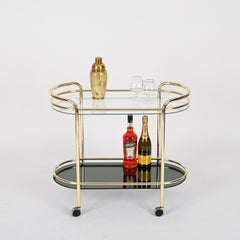 Carrito de bar italiano de mediados de siglo en metal dorado y cristal de espejo verde, años 70