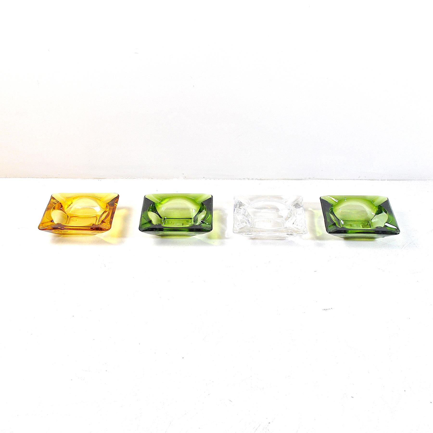 Set of 4 ashtray in different glass colored from the late 1960s.