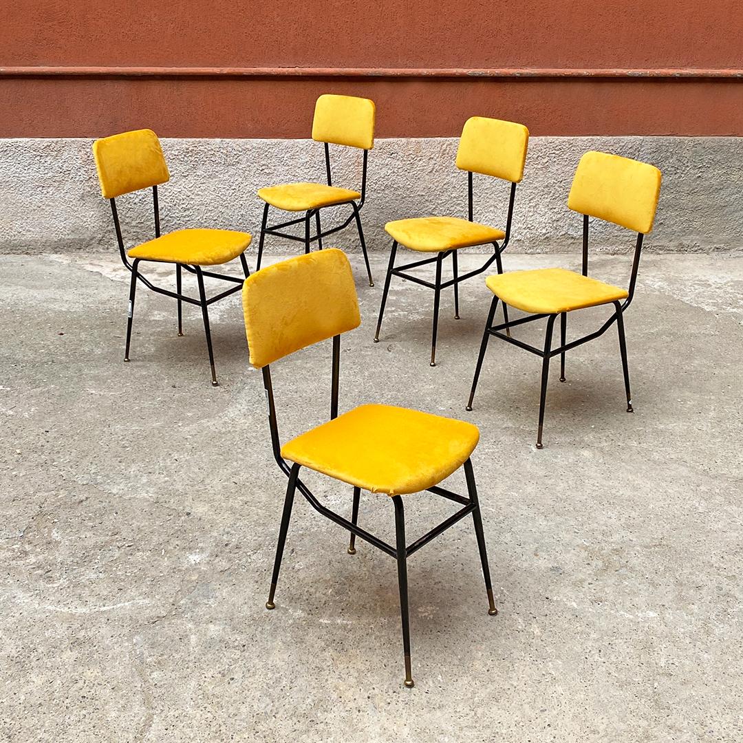 Italian Mid-Century Modern set of five fire yellow velvet and black metal structure chairs, 1960s.
Set of five chairs with black metal structure, with seat and back upholstered in fire yellow fabric and brass tips.
1960s
Excellent condition,