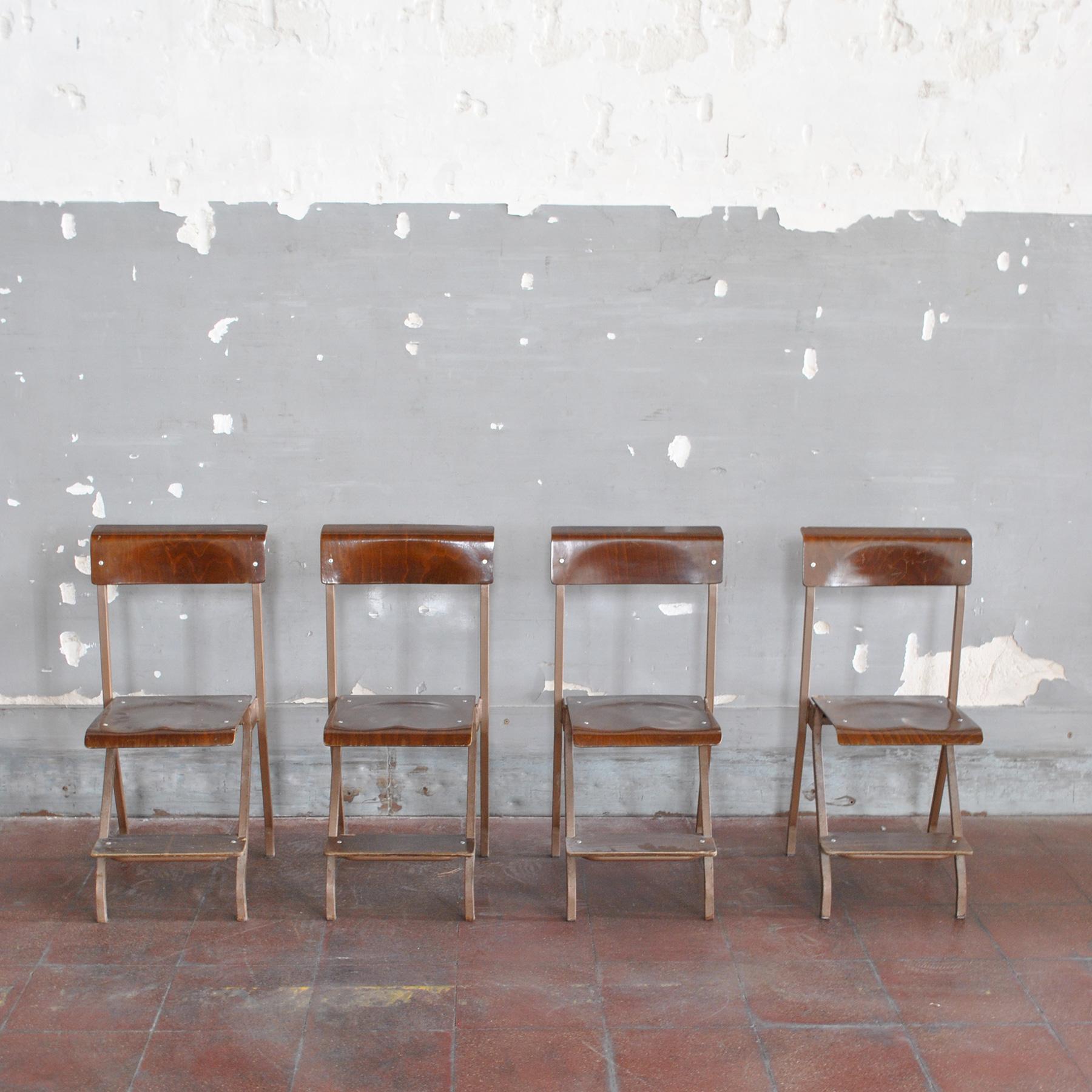 Set of four folding chairs italian production from mid fifties in wood and metal