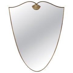 Italian Mid-Century Shield-Form Brass Mirror with Shell Crest, circa 1950
