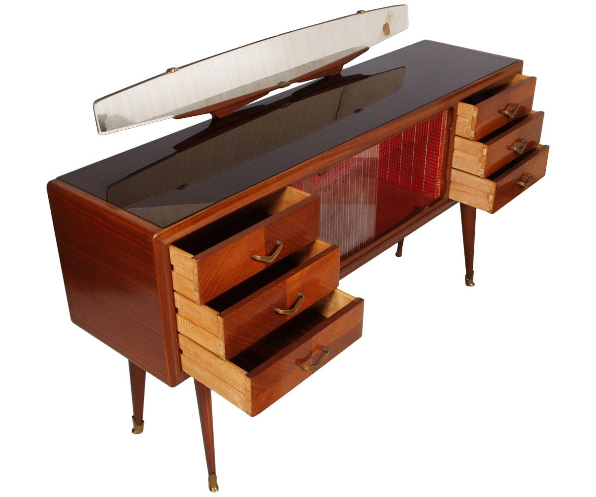 Paolo Buffa Dry Bar Buffet sideboard of the 1940s, in walnut and rosewood veneer. Shaped top mirror, black lacquered glass top, two sliding glass door on central mirrored display, three drawers for both sides, original gilt brass handles, conoid