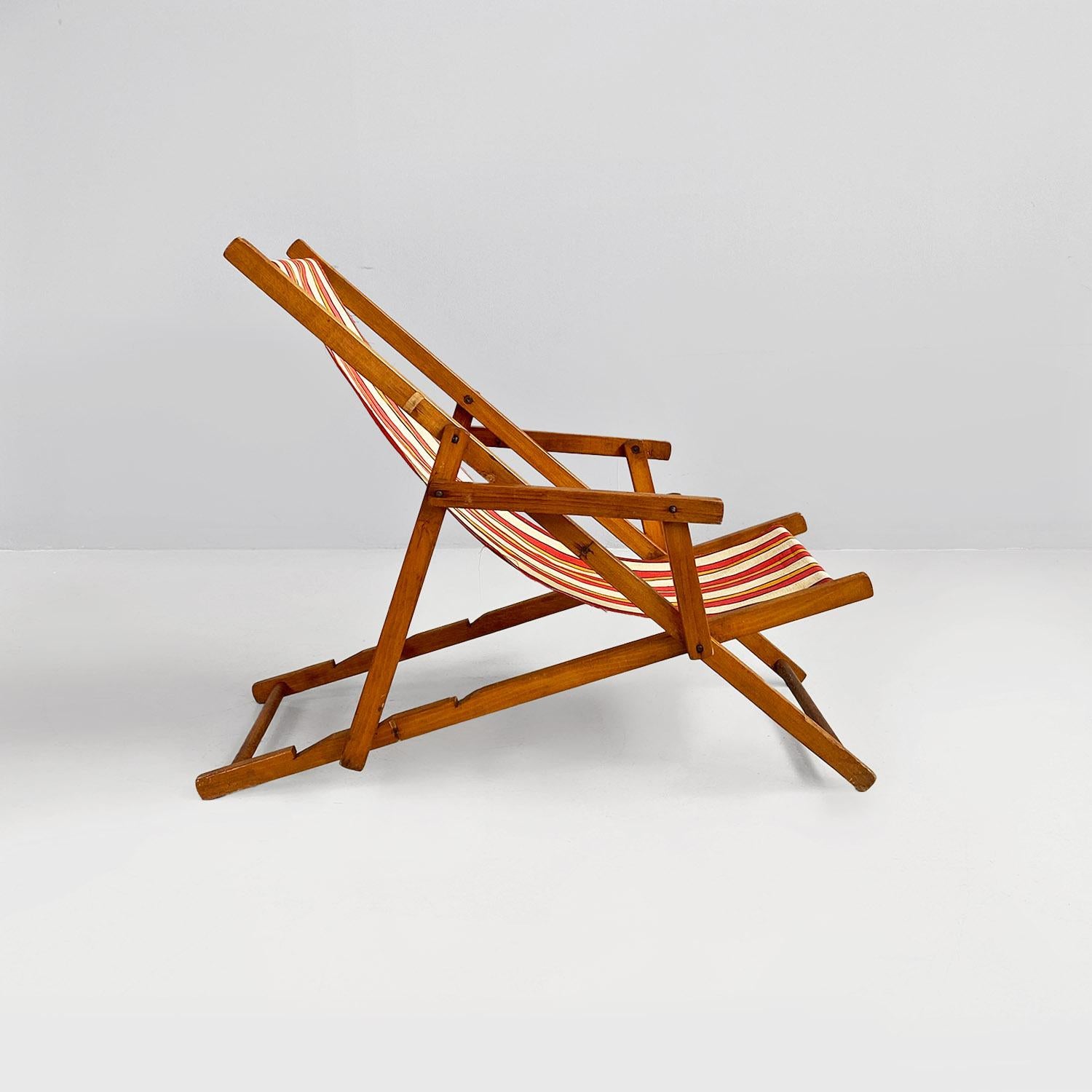 Fabric Italian mid-century small wooden and original colored fabric deckchair, 1950s For Sale