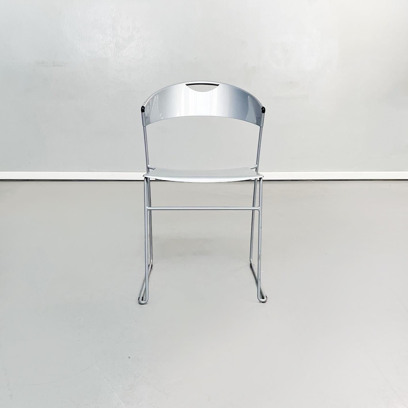 Italian mid-century steel chairs Juliette HW 601 by Wettstein for Baleri, 1980s
Set of 4 chairs model Juliette HW 601 with squared seat with rounded corners and edge, in gray painted steel. The curved back has small black inserts on the edges. The