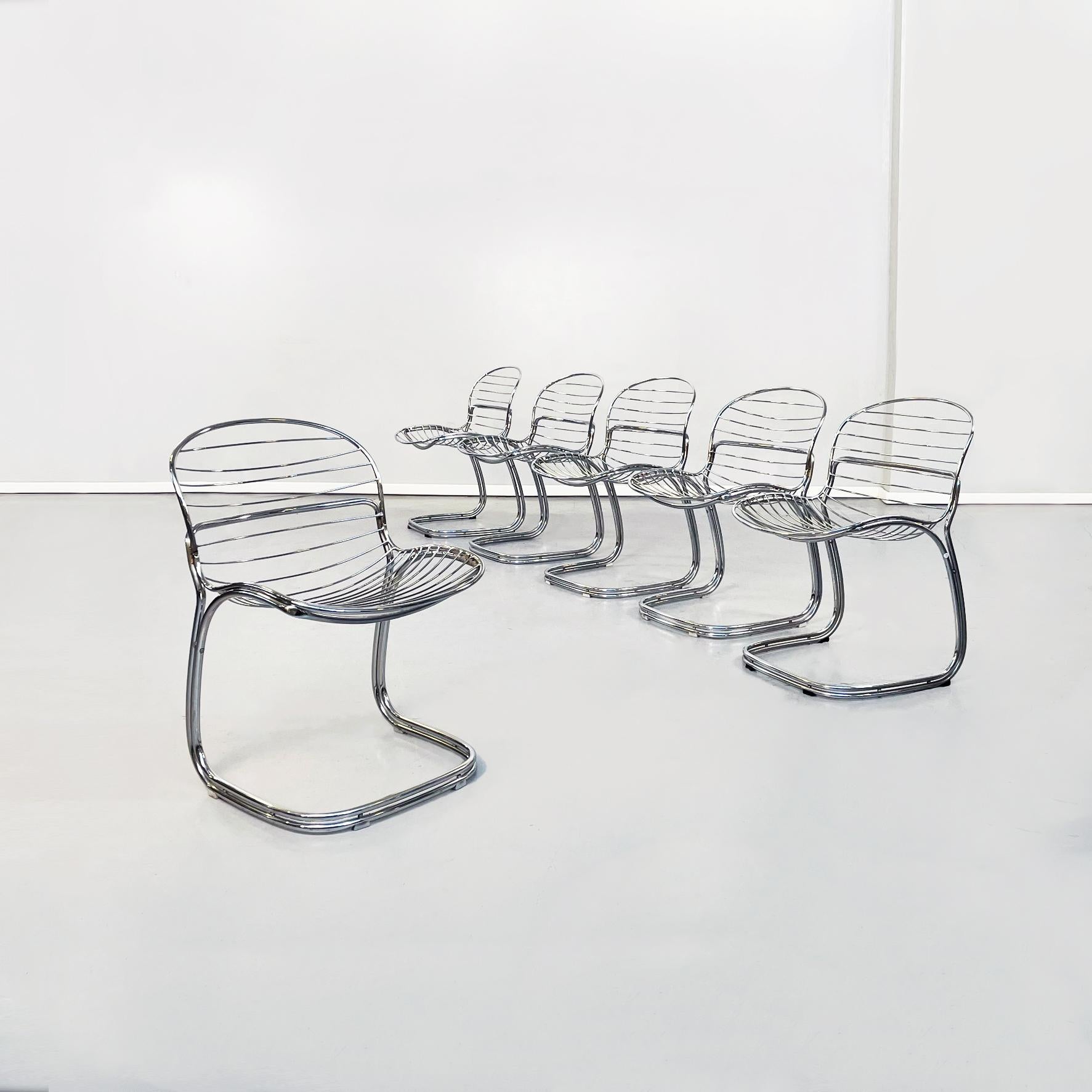 Italian mid-century steel sabrina chairs by Gastone Rinaldi for Rima, 1970s
Set of 17 Sabrina chairs in curved chromed steel. The seat and back are made of fine tubular chromed steel that follows the shape of the body.
Produced by Rima in 1970s