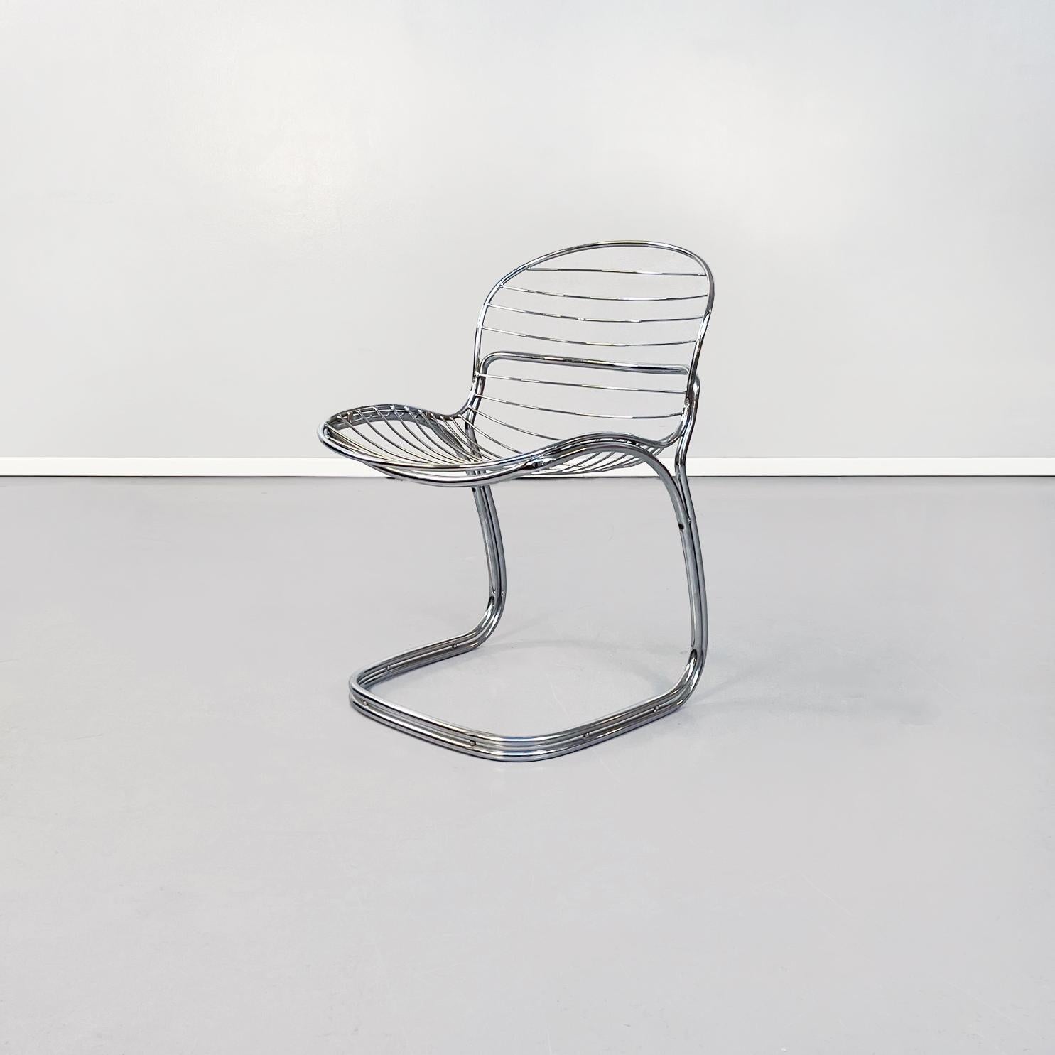 Italian mid-century steel Sabrina chairs by Gastone Rinaldi for Rima, 1970s
Set of 2 Sabrina chairs in curved chromed steel. The seat and back are made of fine tubular chromed steel that follows the shape of the body.
Produced by Rima in 1970s and