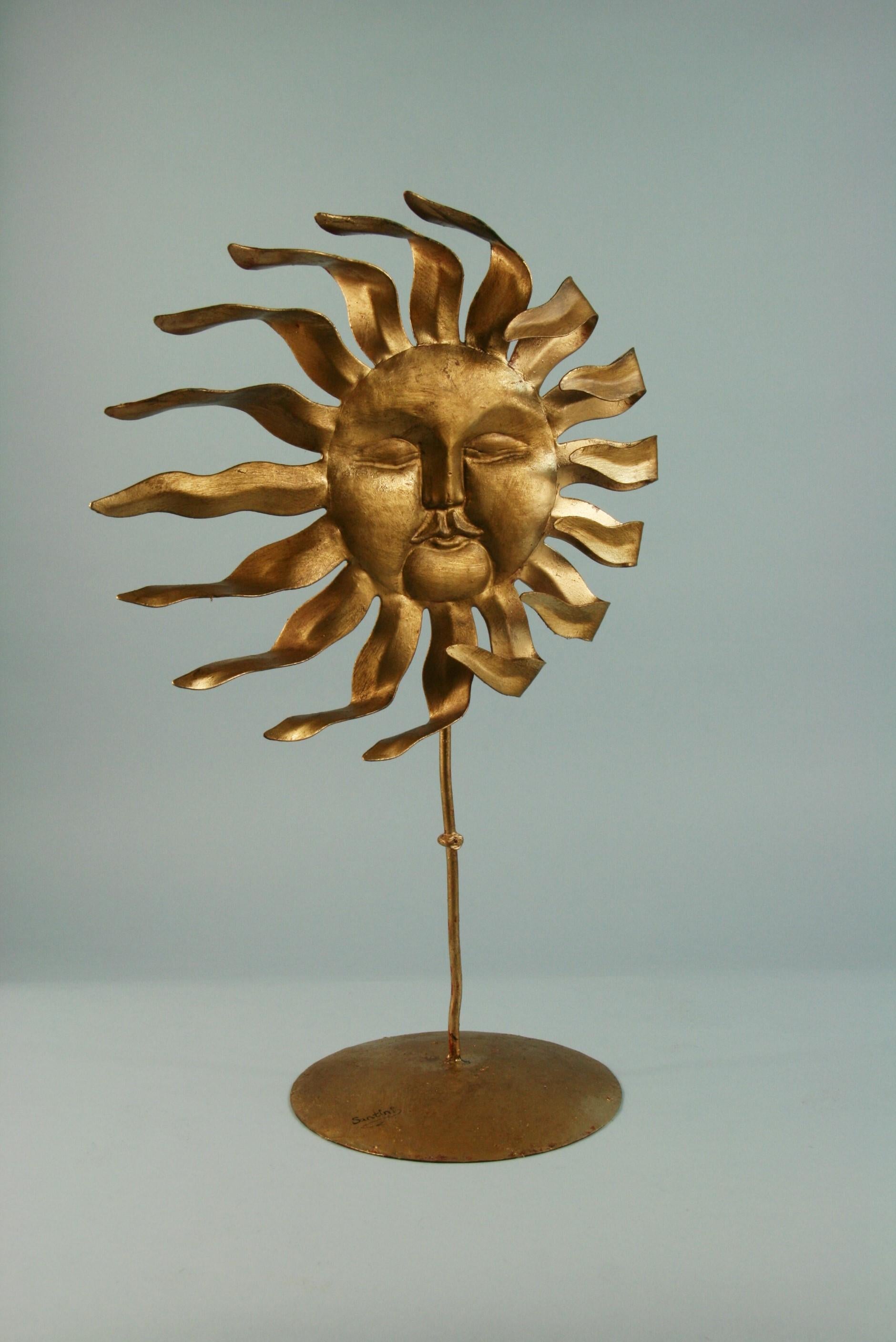 3-487 hand made metal sculpture sun in the wind by Santini.