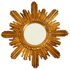 Italian Mid Century Sunburst gold-plated wall mirror made of wood and resin
