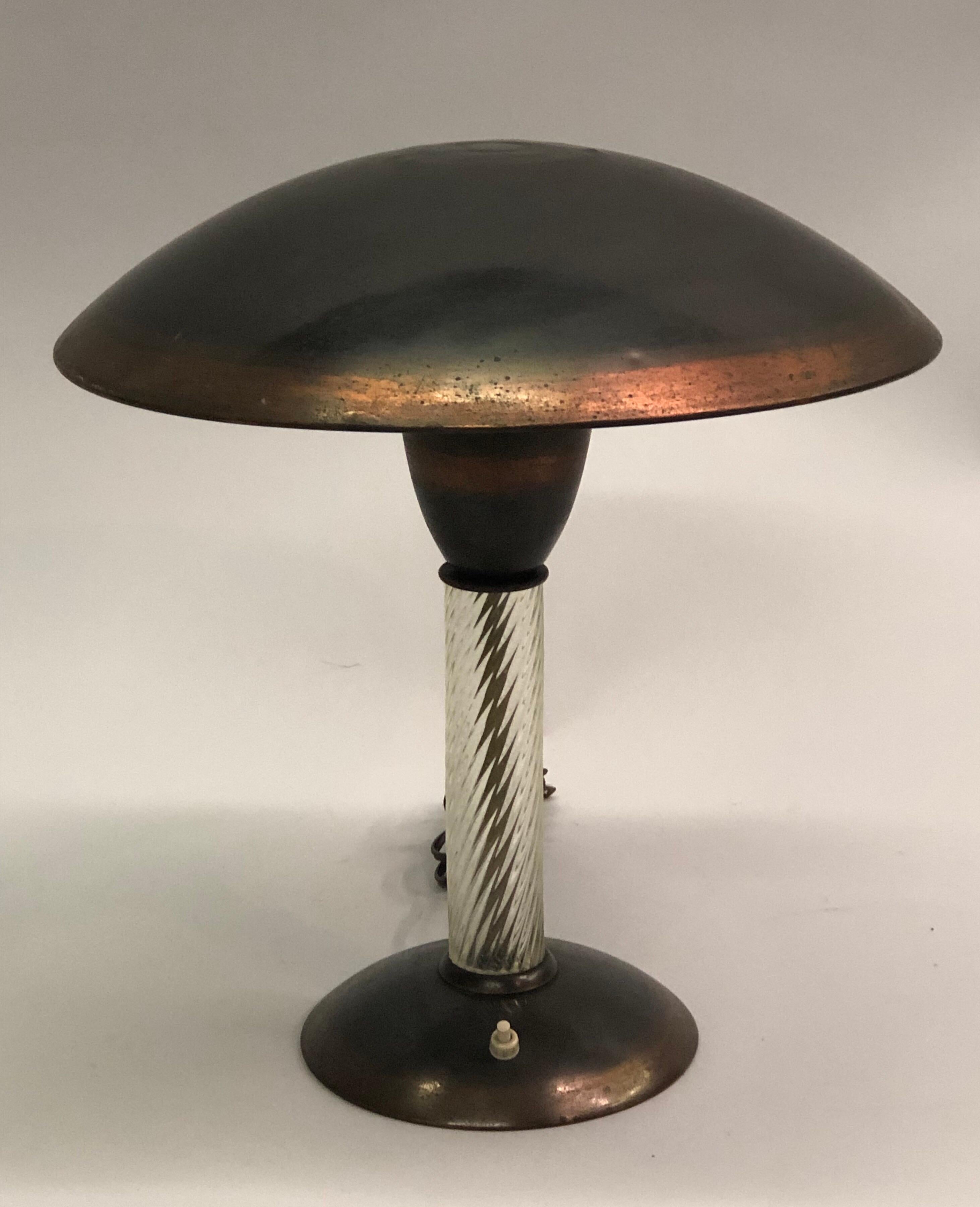 A Rare and Exquisite Italian Art Deco / Mid-Century Modern desk or table lamp featuring the craftsmanship of the design leaders of the 20th Century and uniting timeless materials: metal and hand blown glass. The piece is composed in metal and copper
