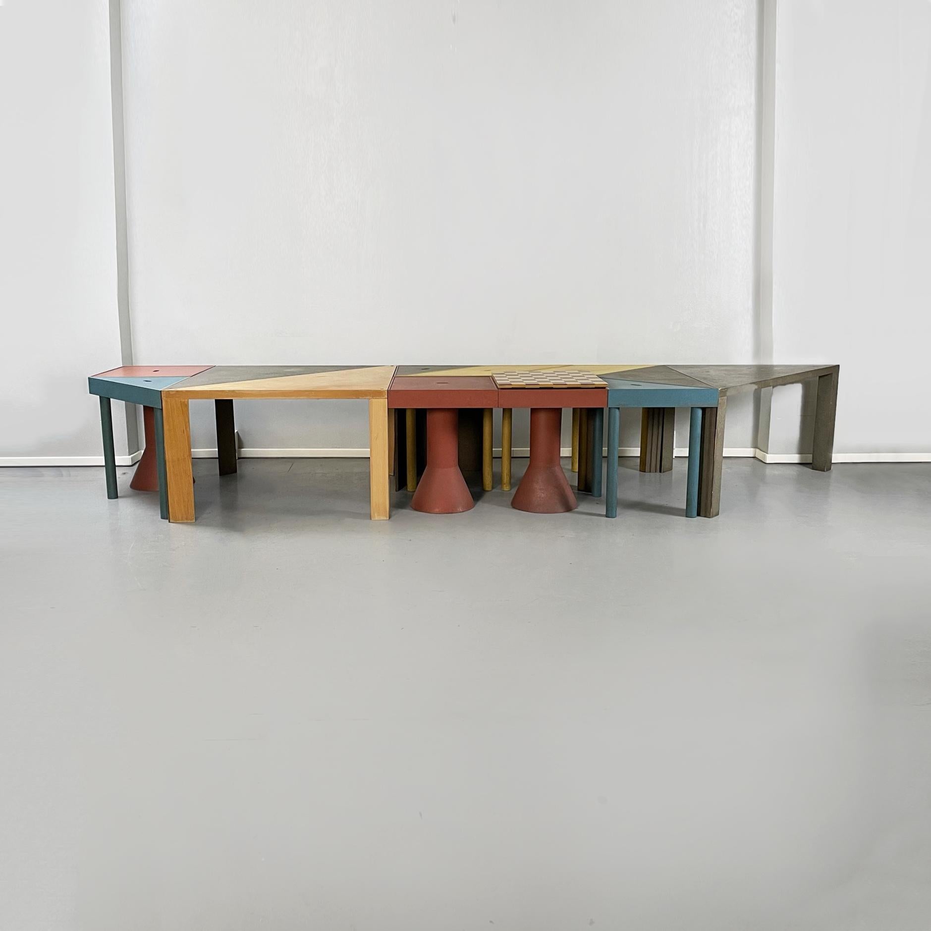 Italian mid-century Tangram modular table by Massimo Morozzi for Cassina, 1990s
Tangram modular table consisting of thirteen wooden pieces: three red squares, two large gray triangles, a wood-colored triangle, two blue right-angled triangles, a