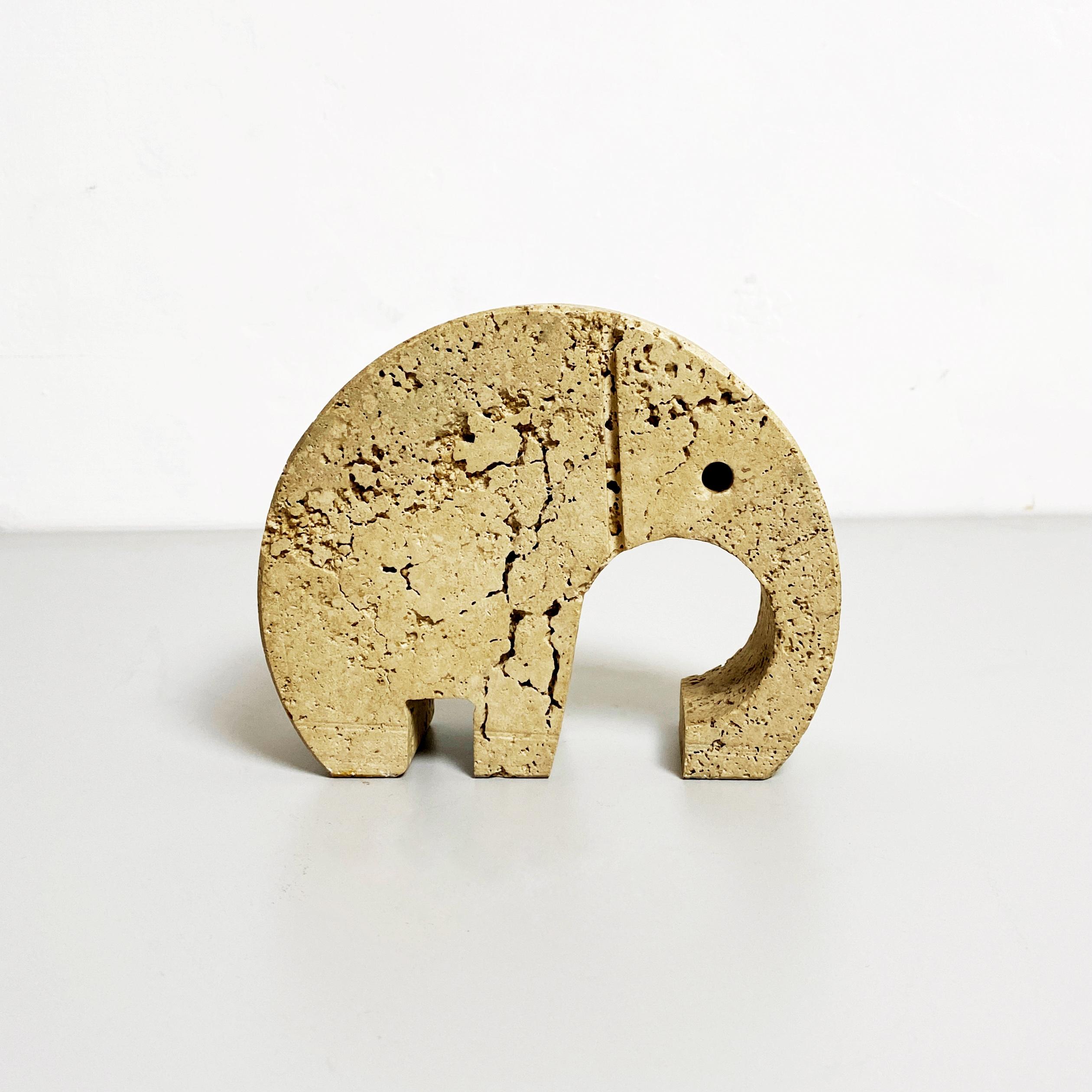 Travertine Elephant sculpture by Mannelli brothers, 1960s
Elephant in Rapolano travertin designed by the Mannelli brothers.

1960s

Very good condition.

Measures in cm 16x5x13 H.