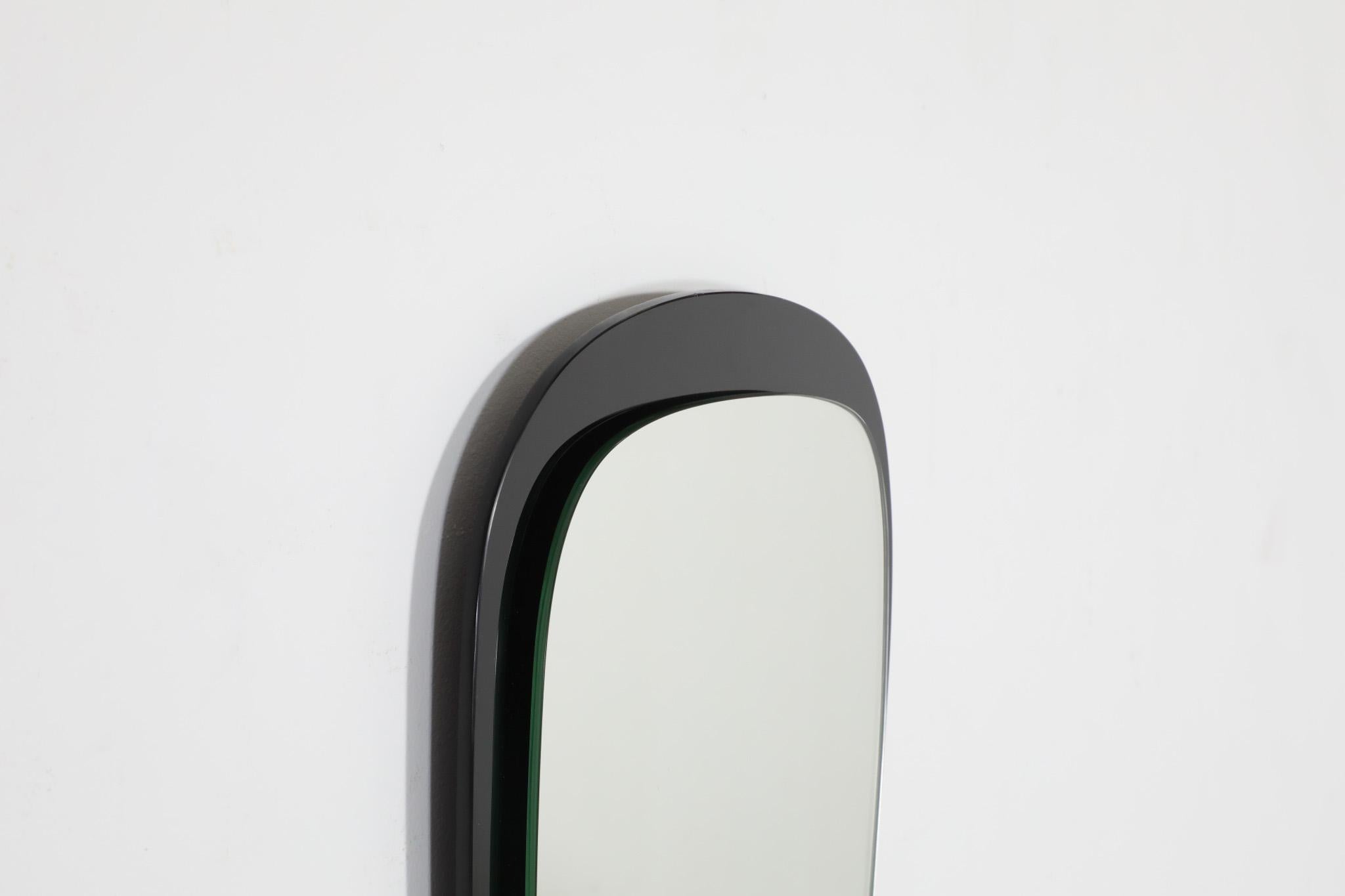 Mid-Century Modern Italian Mid-Century Triangular Wall Hanging Mirror with Black Backing For Sale