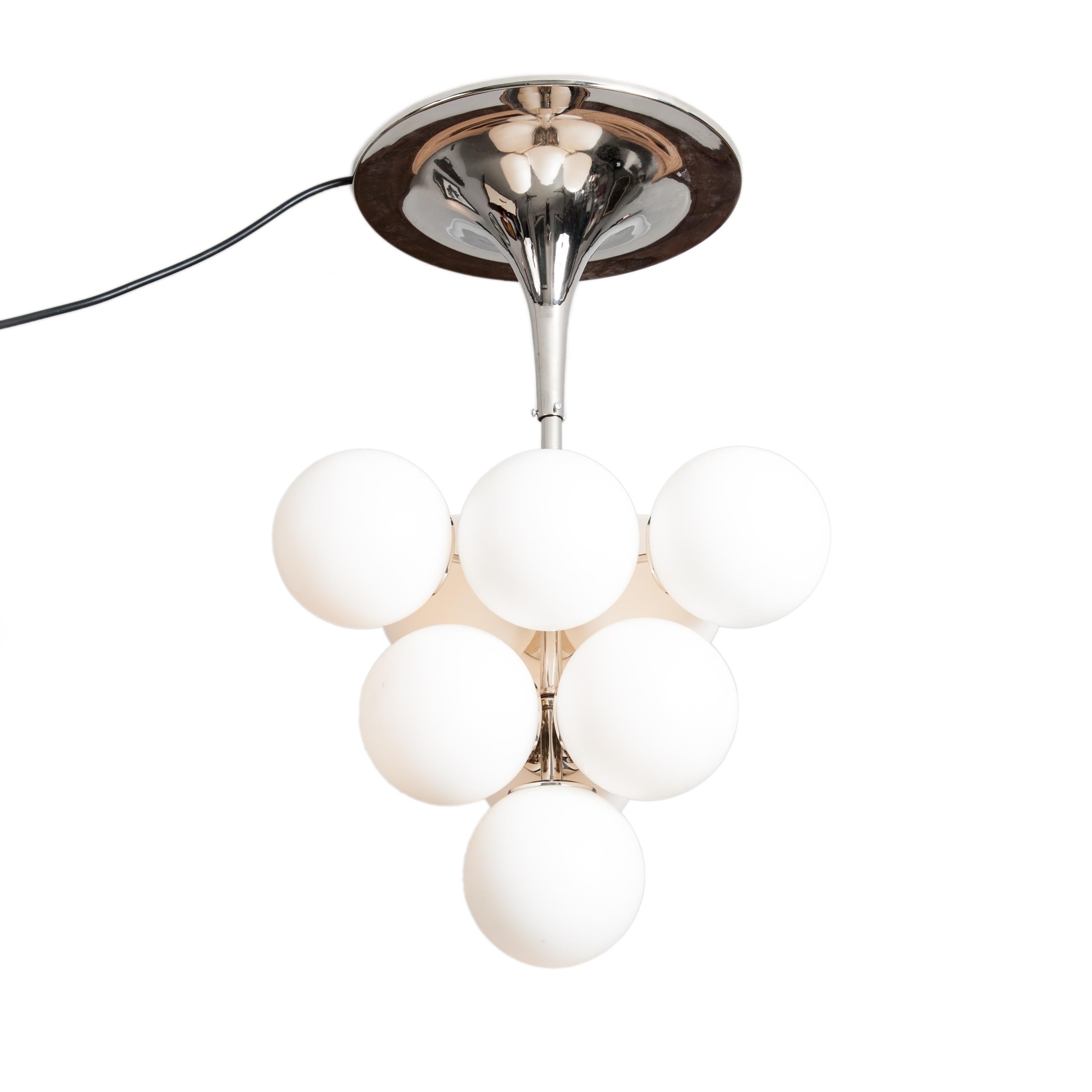 Italian midcentury vintage bubble opal glass chandelier re-nickeled base, 1950s.

This Italian chandelier from the 1950s is shaped like a wine grape with 12 white shades, (re-newed electrification)
The diameter of one opal glass bubble is 15cm