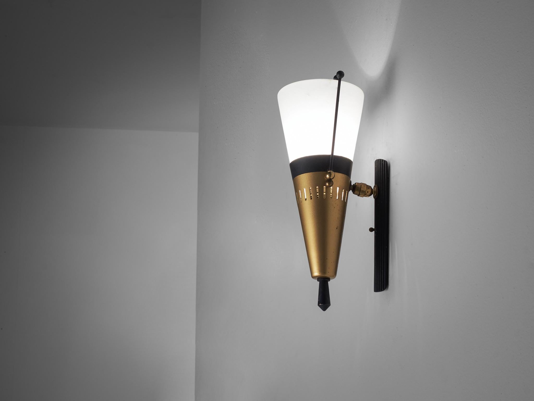 Wall light, brass, glass, coated aluminum, Italy, 1950s

This elegant light from Italy features a cone shape with a perforated brass socket that holds the glass shade. It has a very spherical and soft light partition due to the white opaque glass