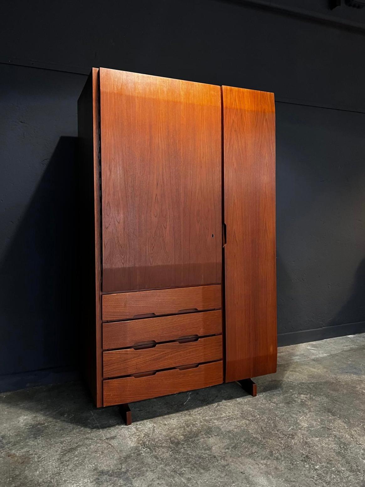Mid-Century Modern wardrobes - Vintage Italian wood armoires - Architectural Walnut Cabinets

Presented for sale is a beautiful and attractive wardrobe, made in Italy in the 1950s and extremely well manufactured out of walnut. The piece, designed