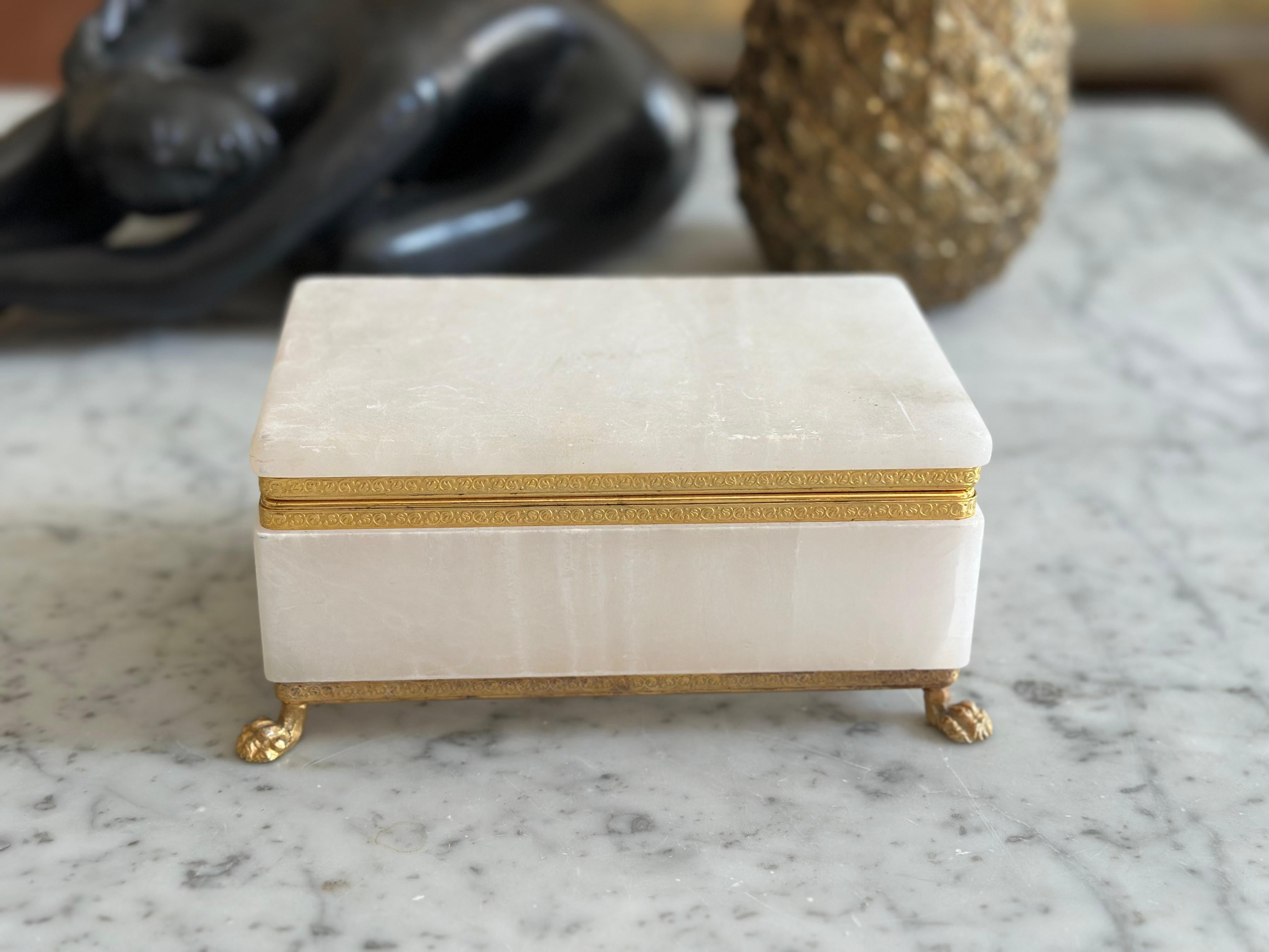 This rare Italian jewelry box, crafted in the 1960s, is made from white translucent marble and beautifully echoes the tradition of opaline jewelry caskets produced in Italy, Bohemia, and France between 1850 and 1920. Larger than most boxes of its