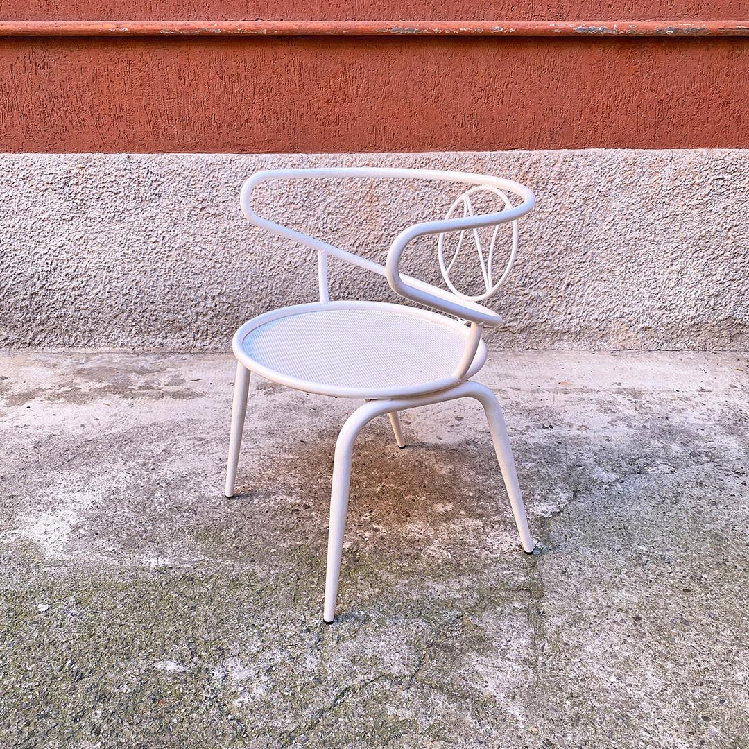 Italian mid century modern enamelled white metal frame outdoor chair with armrests and decorate back, 1950s
Outdoor chair with enamelled metal frame, with armrests and micro-perforated seat, with an 